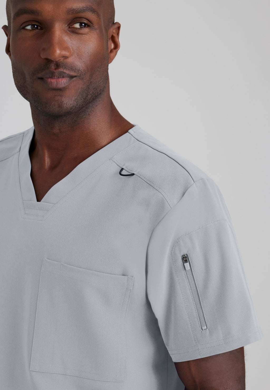 Detail Shot of the Murphy 2-Pocket V-Neck Scrub Top in Moonstruck from Grey's Anatomy™ by Barco Spandex Stretch