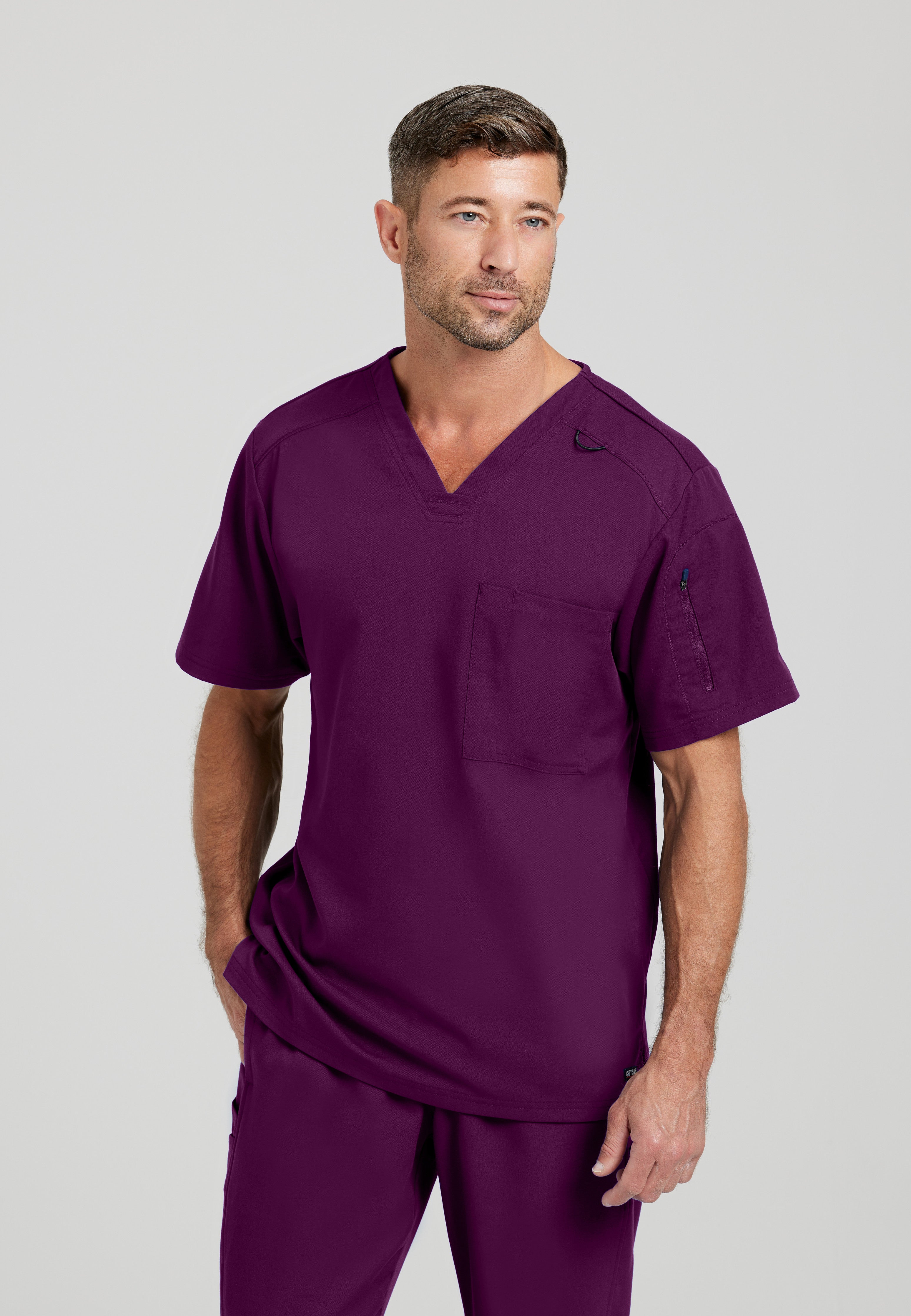 Front View of the Murphy 2-Pocket V-Neck Scrub Top in Wine from Grey's Anatomy™ by Barco Spandex Stretch
