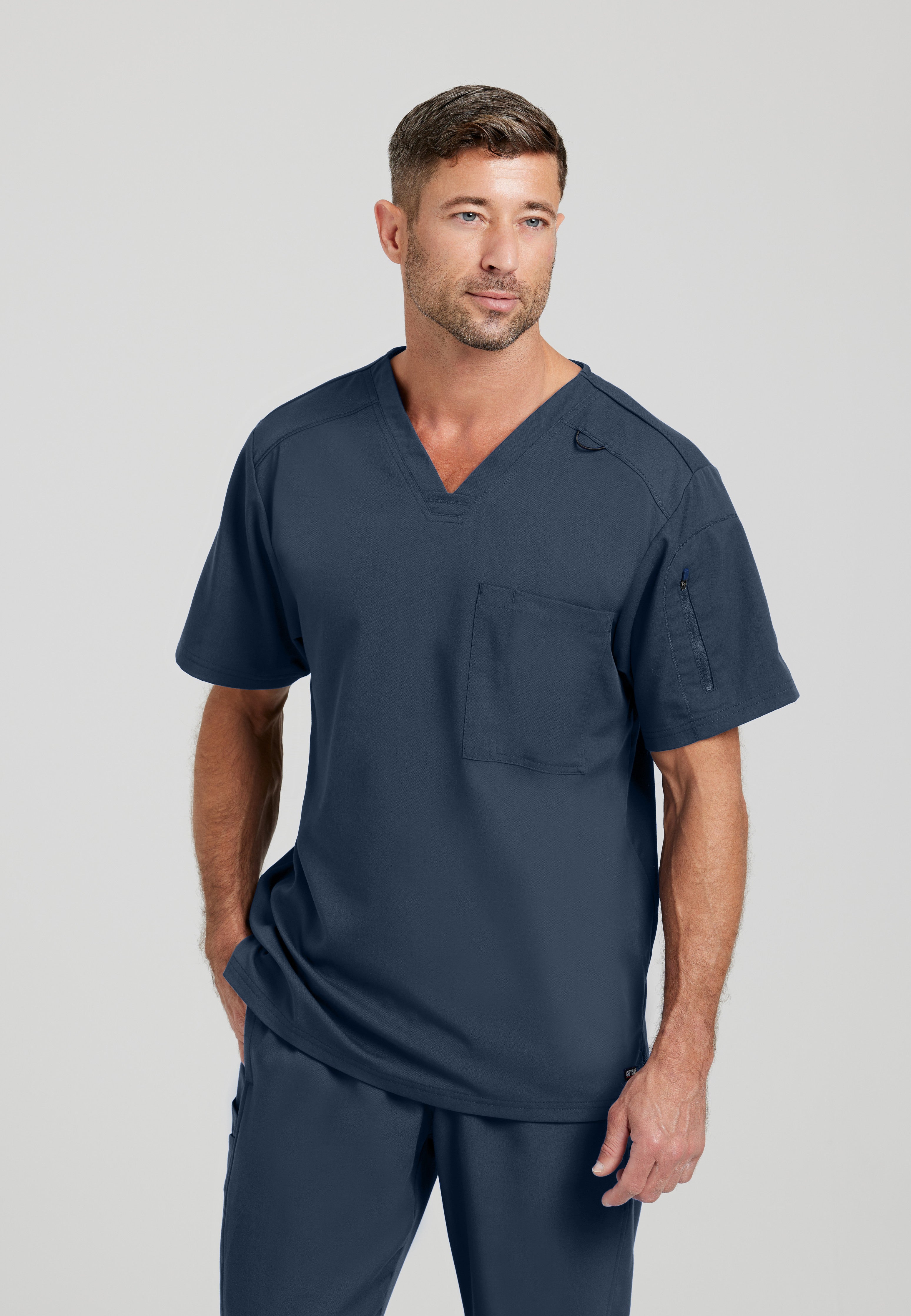 Front View of the Murphy 2-Pocket V-Neck Scrub Top in Steel from Grey's Anatomy™ by Barco Spandex Stretch