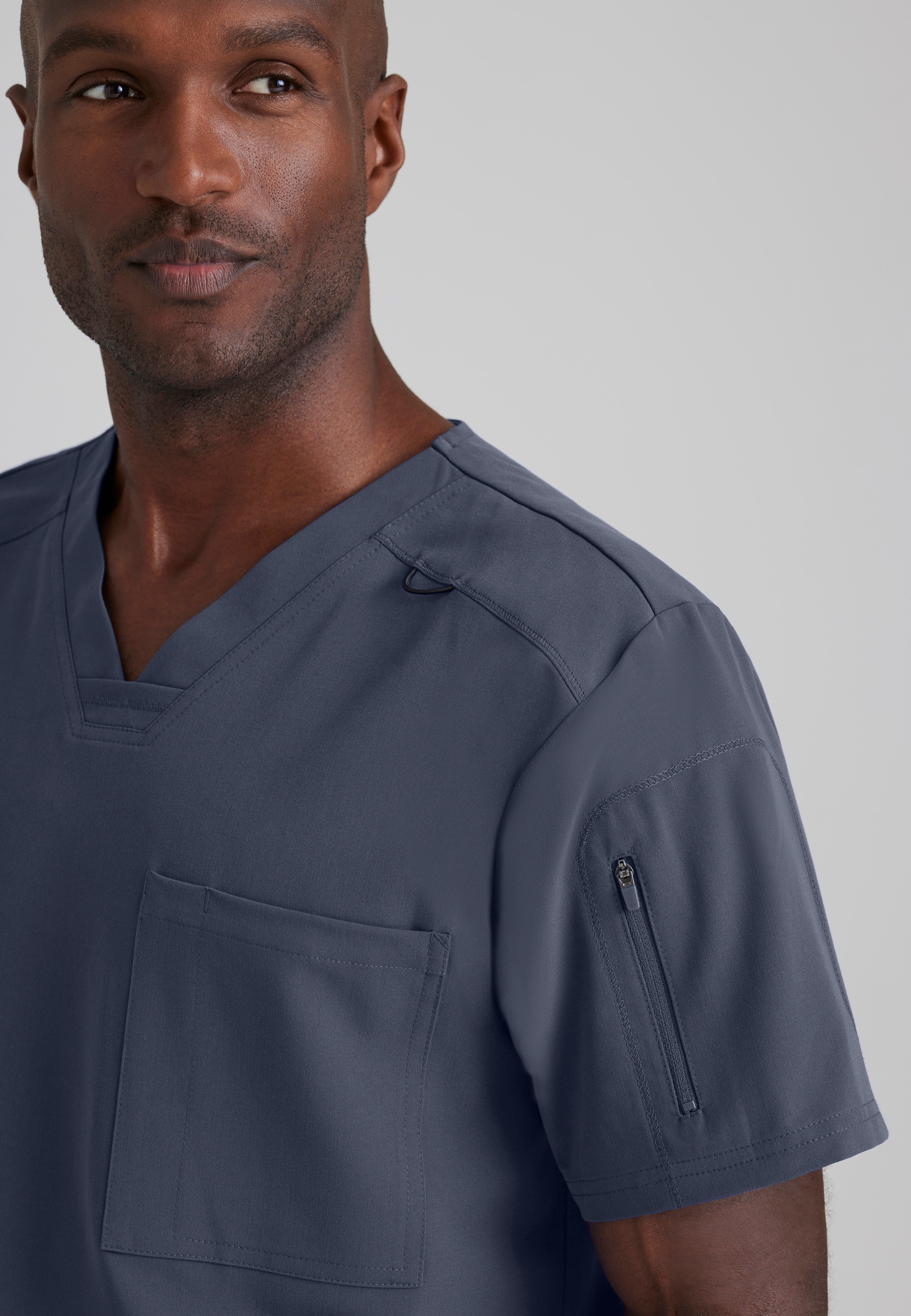 Detail Shot of the Murphy 2-Pocket V-Neck Scrub Top in Steel from Grey's Anatomy™ by Barco Spandex Stretch
