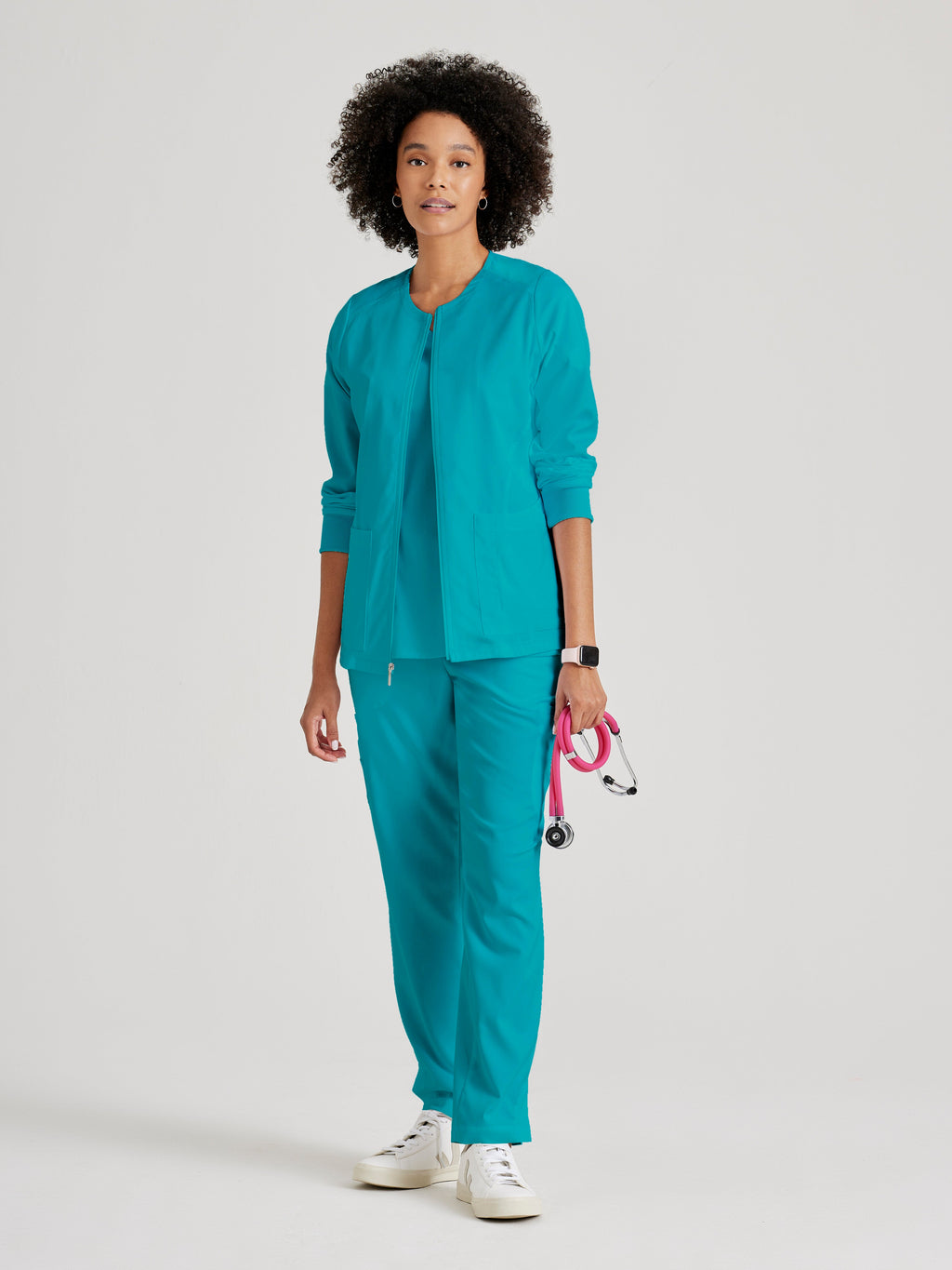 Grey's Anatomy Spandex-Stretch Women’s teal Warm-Up Scrub Jacket. Zip front round neck. 5 pockets. Rib cuff sleeve. 
