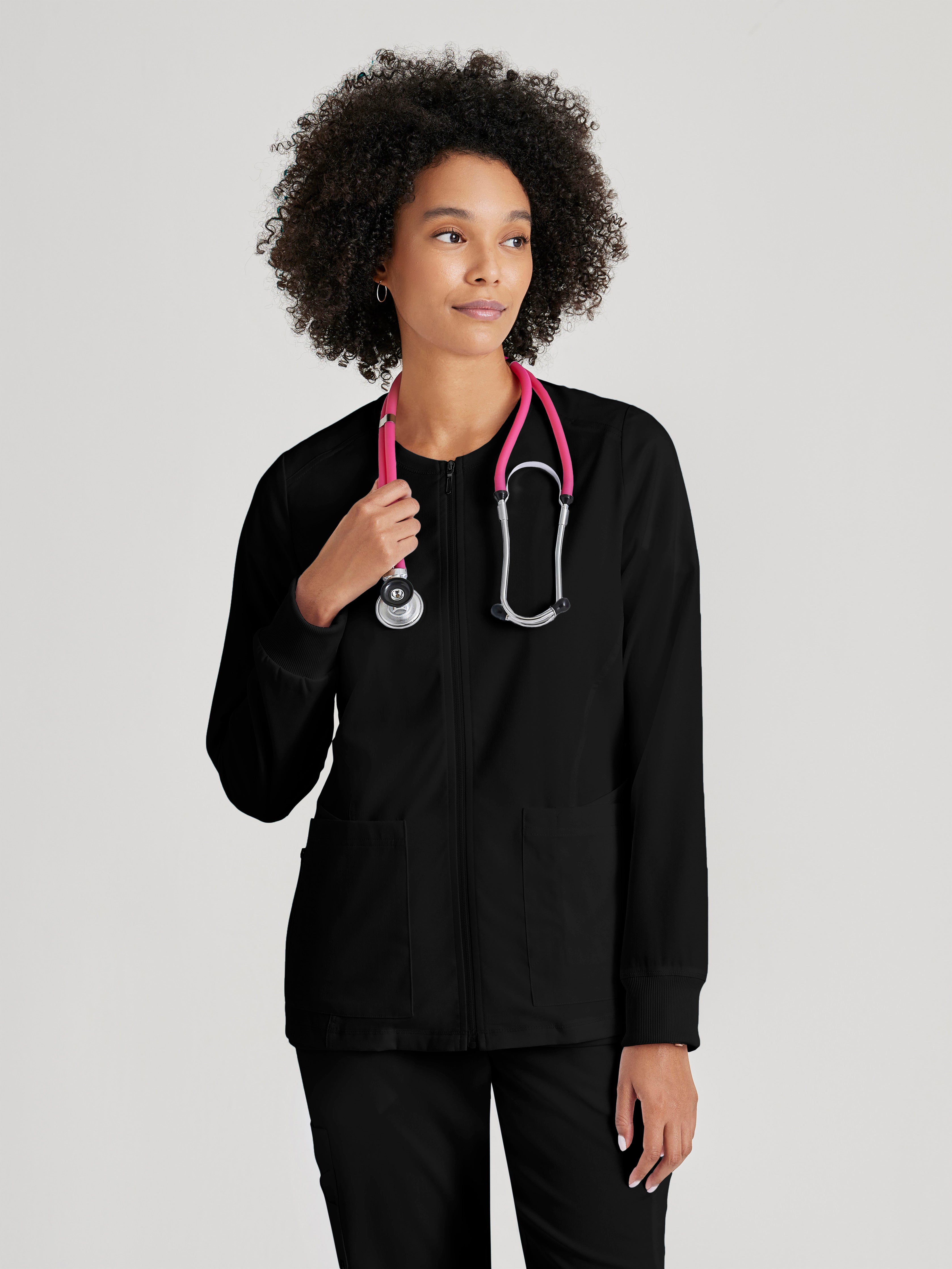 Front View of the Gianna 5-Pocket Crewneck Scrub Jacket in Black from Grey's Anatomy™ by Barco Spandex Stretch
