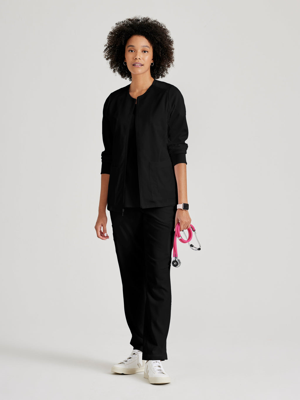 Full Body View of the Gianna 5-Pocket Crewneck Scrub Jacket in Black from Grey's Anatomy™ by Barco Spandex Stretch