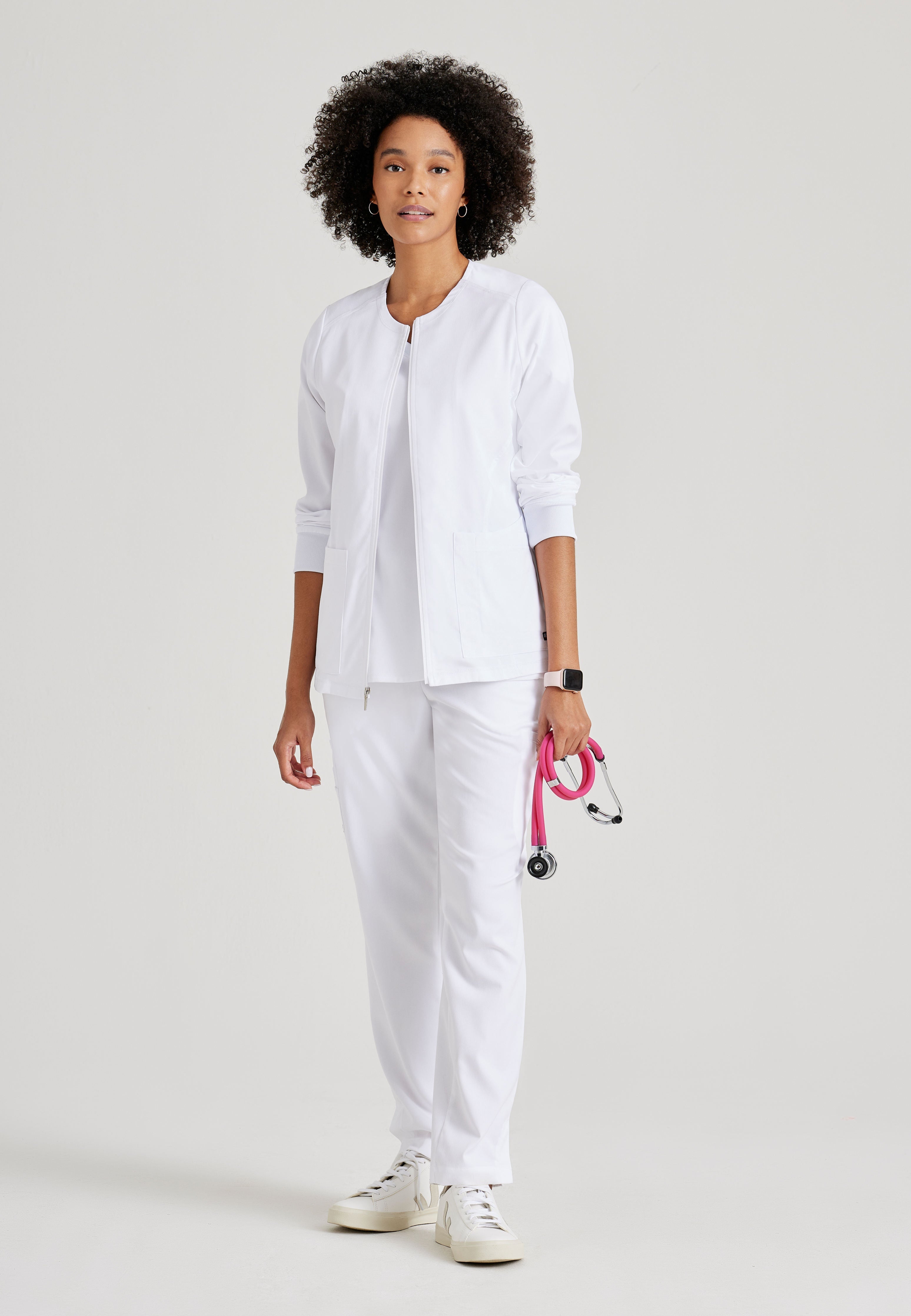 Grey's Anatomy Spandex-Stretch Women’s White Warm-Up Scrub Jacket. Zip front round neck. 5 pockets. Rib cuff sleeve. 