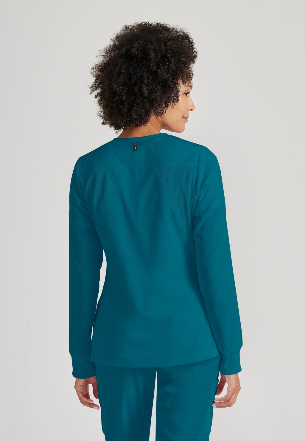 Grey's Anatomy Spandex-Stretch Women’s Bahama Warm-Up Scrub Jacket. Zip front round neck. 5 pockets. Rib cuff sleeve. 