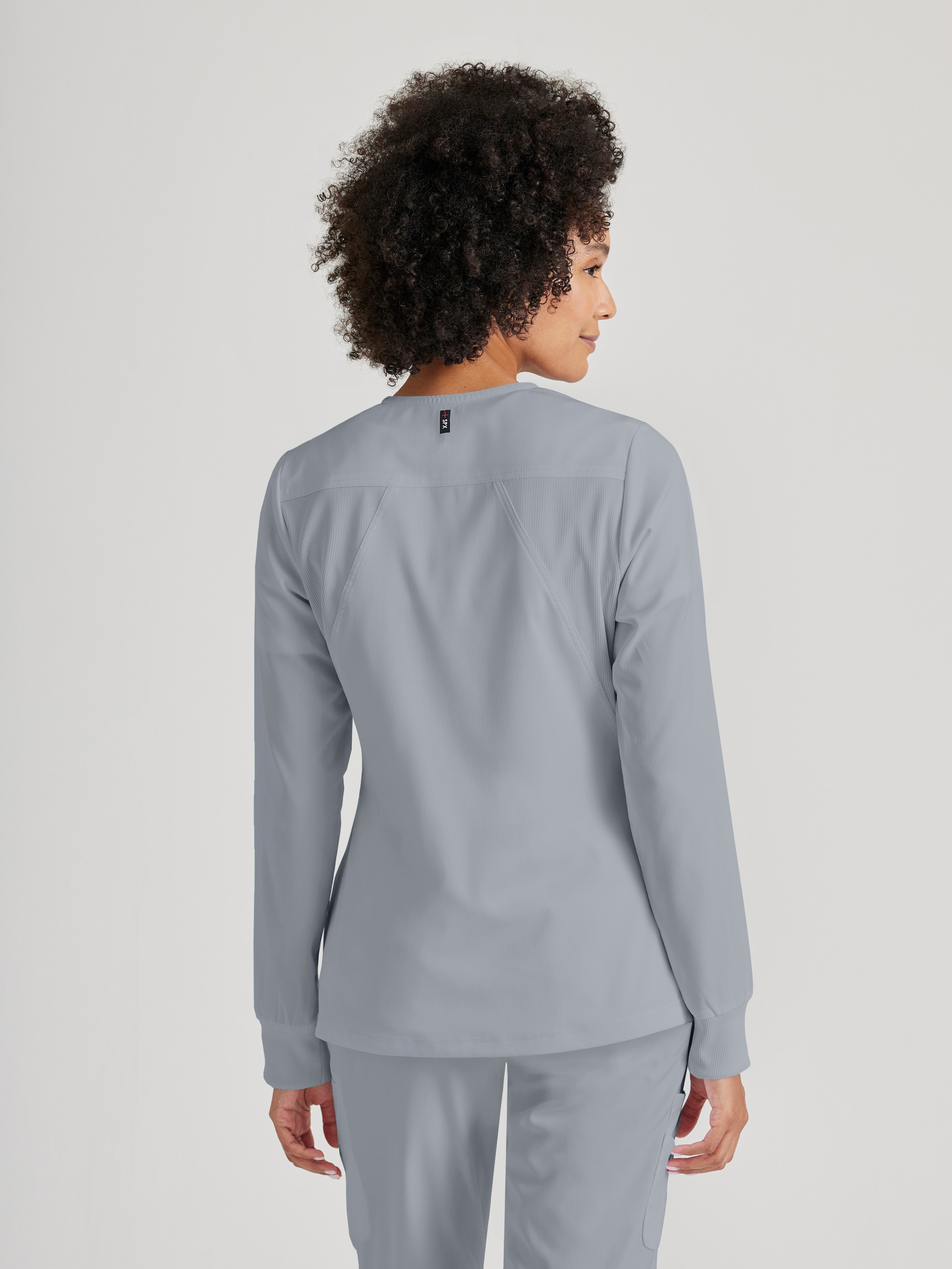 Side View of the Gianna 5-Pocket Crewneck Scrub Jacket in Moonstruck from Grey's Anatomy™ by Barco Spandex Stretch