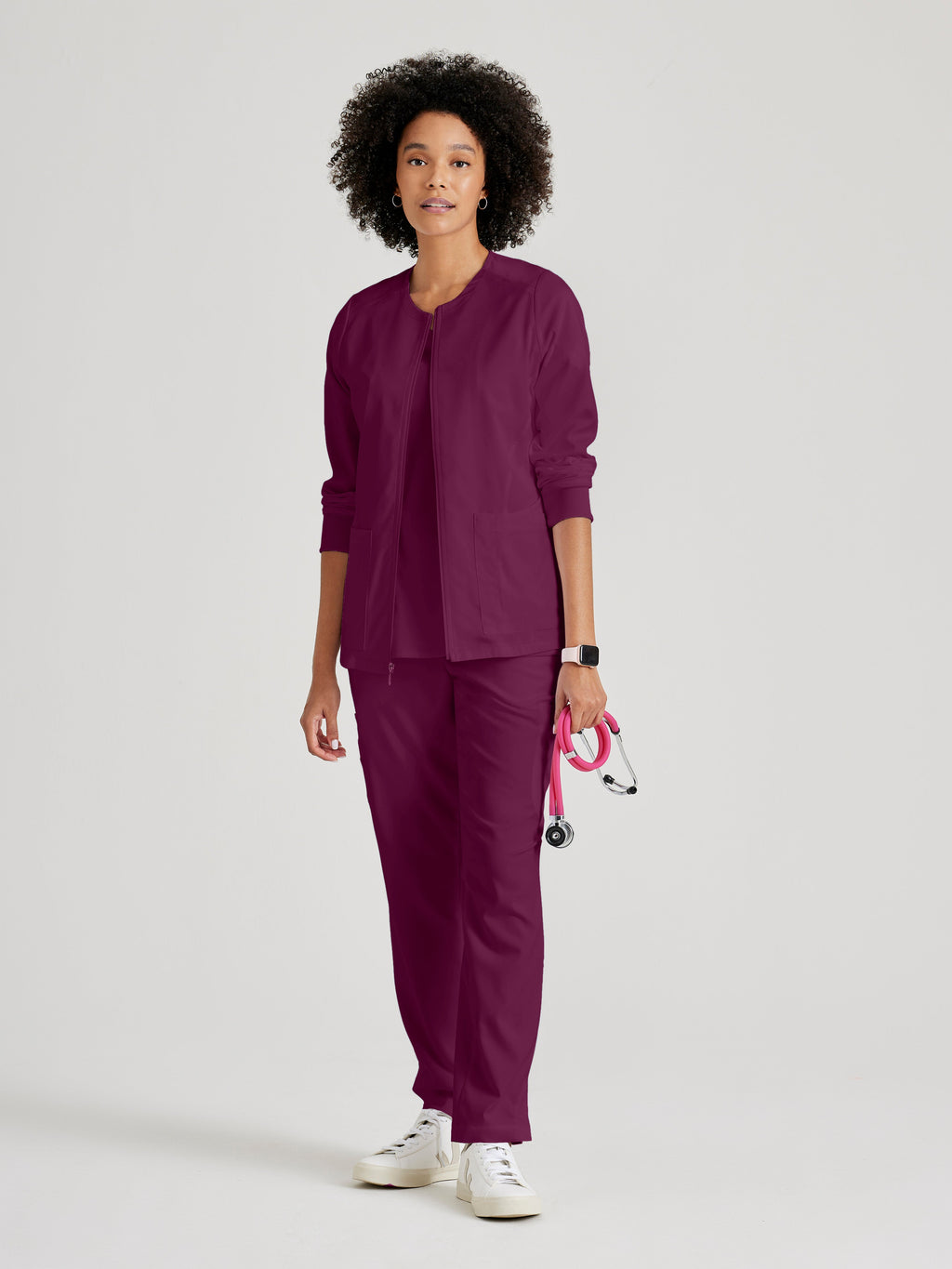 Full Body View of the Gianna 5-Pocket Crewneck Scrub Jacket in Wine from Grey's Anatomy™ by Barco Spandex Stretch
