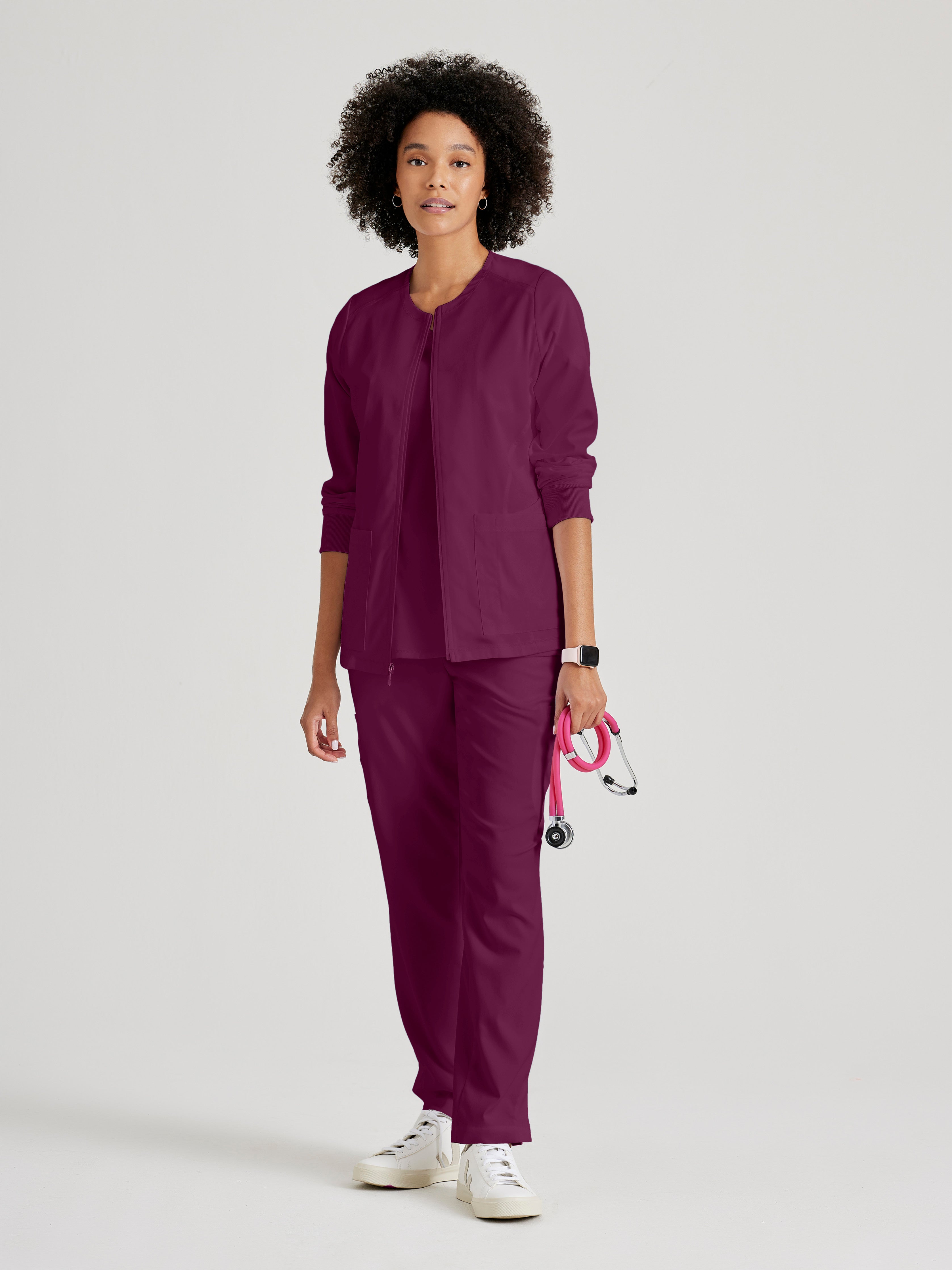 Full Body View of the Gianna 5-Pocket Crewneck Scrub Jacket in Wine from Grey's Anatomy™ by Barco Spandex Stretch