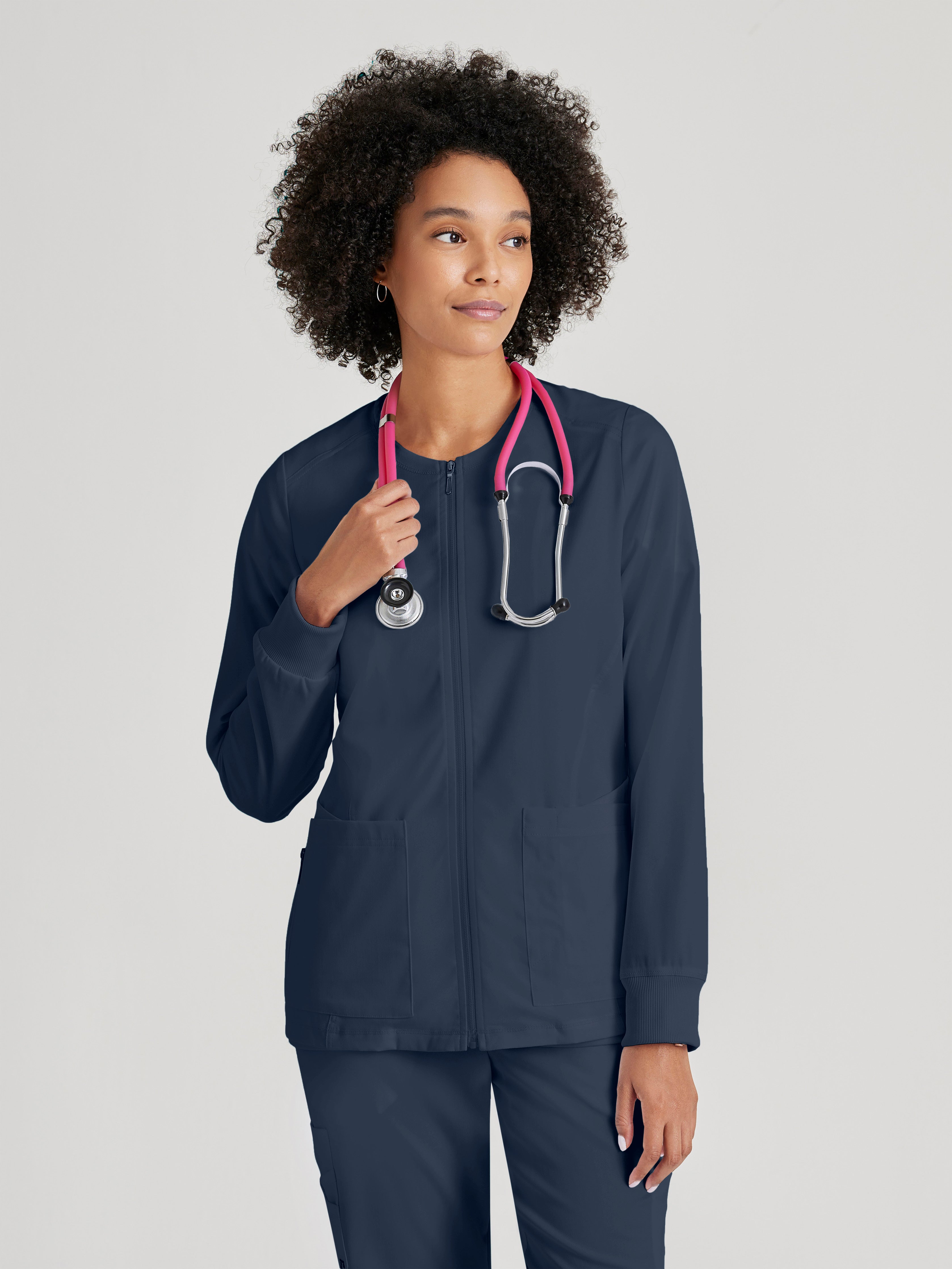 Front View of the Gianna 5-Pocket Crewneck Scrub Jacket in Steel from Grey's Anatomy™ by Barco Spandex Stretch