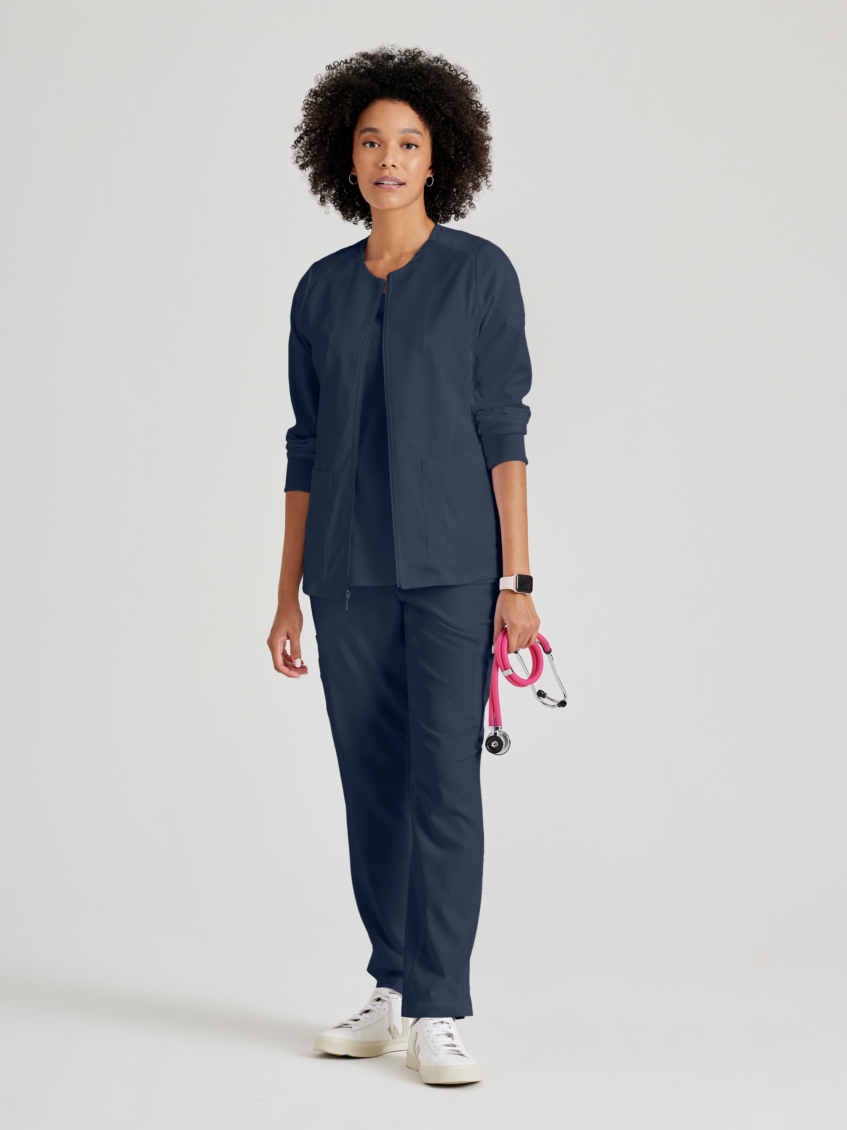Full Body View of the Gianna 5-Pocket Crewneck Scrub Jacket in Steel from Grey's Anatomy™ by Barco Spandex Stretch