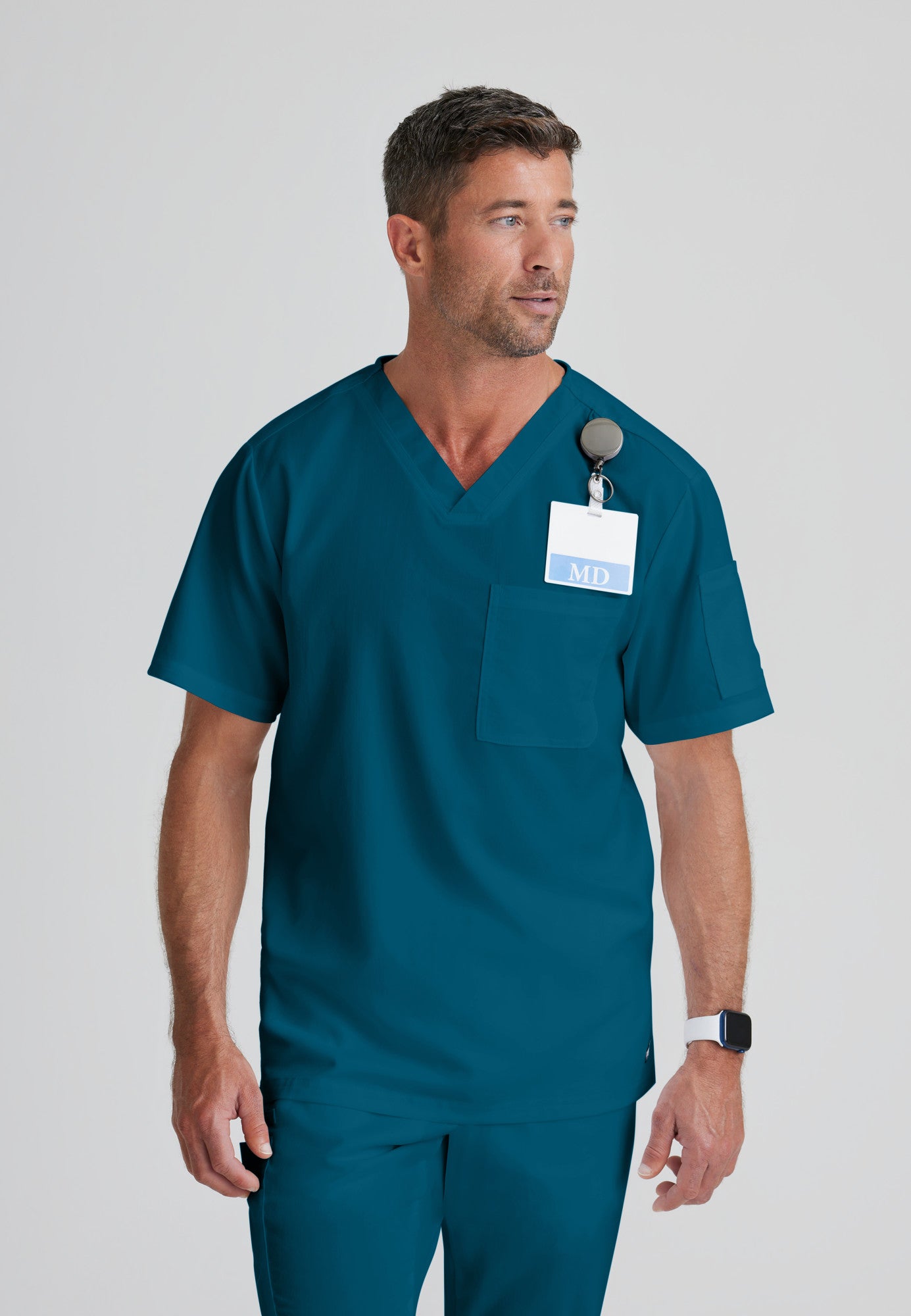 Front View of the Evan 2-Pocket V-Neck Scrub Top in Bahama from Grey's Anatomy™ by Barco Classic