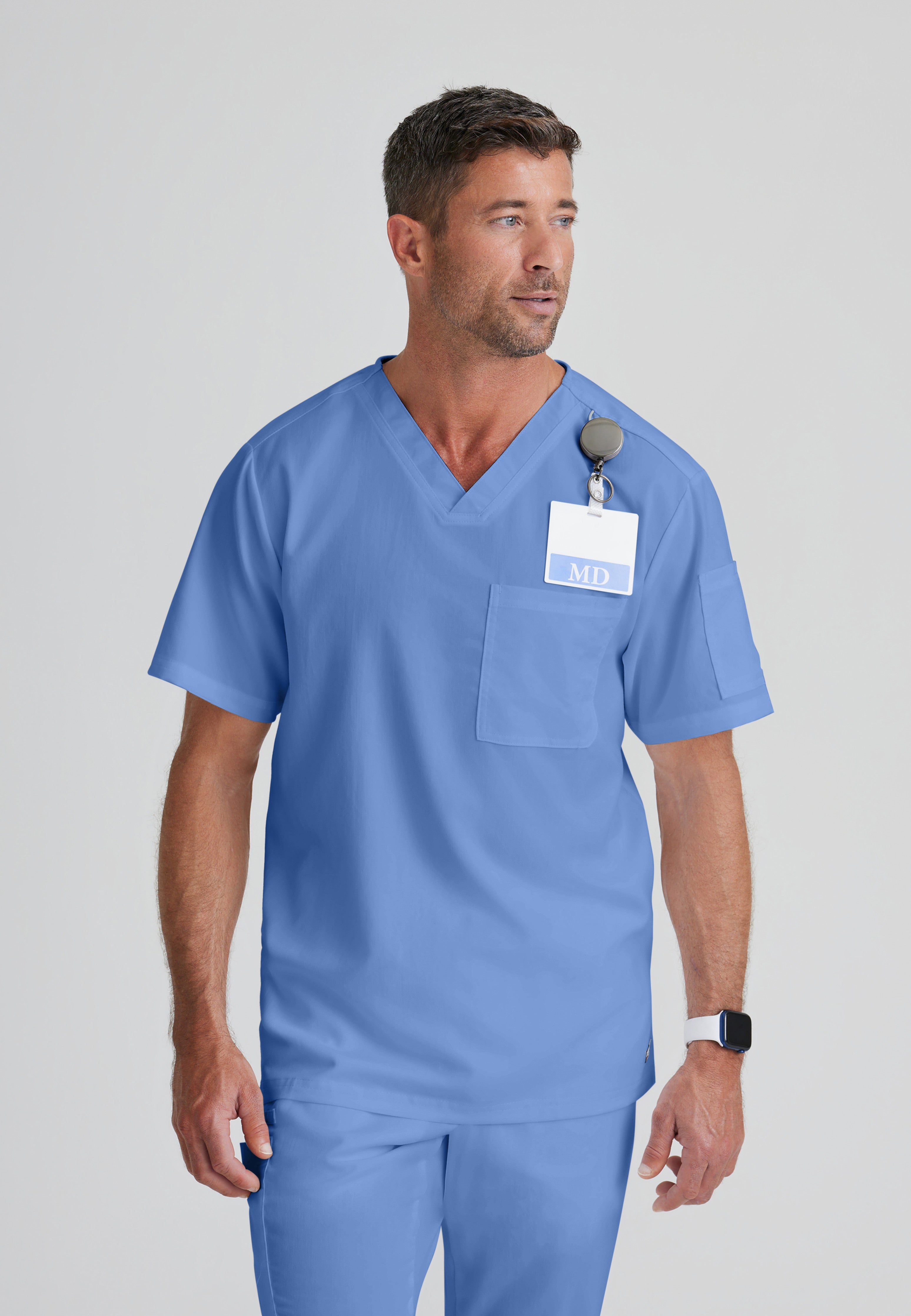 Front View of the Evan 2-Pocket V-Neck Scrub Top in Ciel Blue from Grey's Anatomy™ by Barco Classic