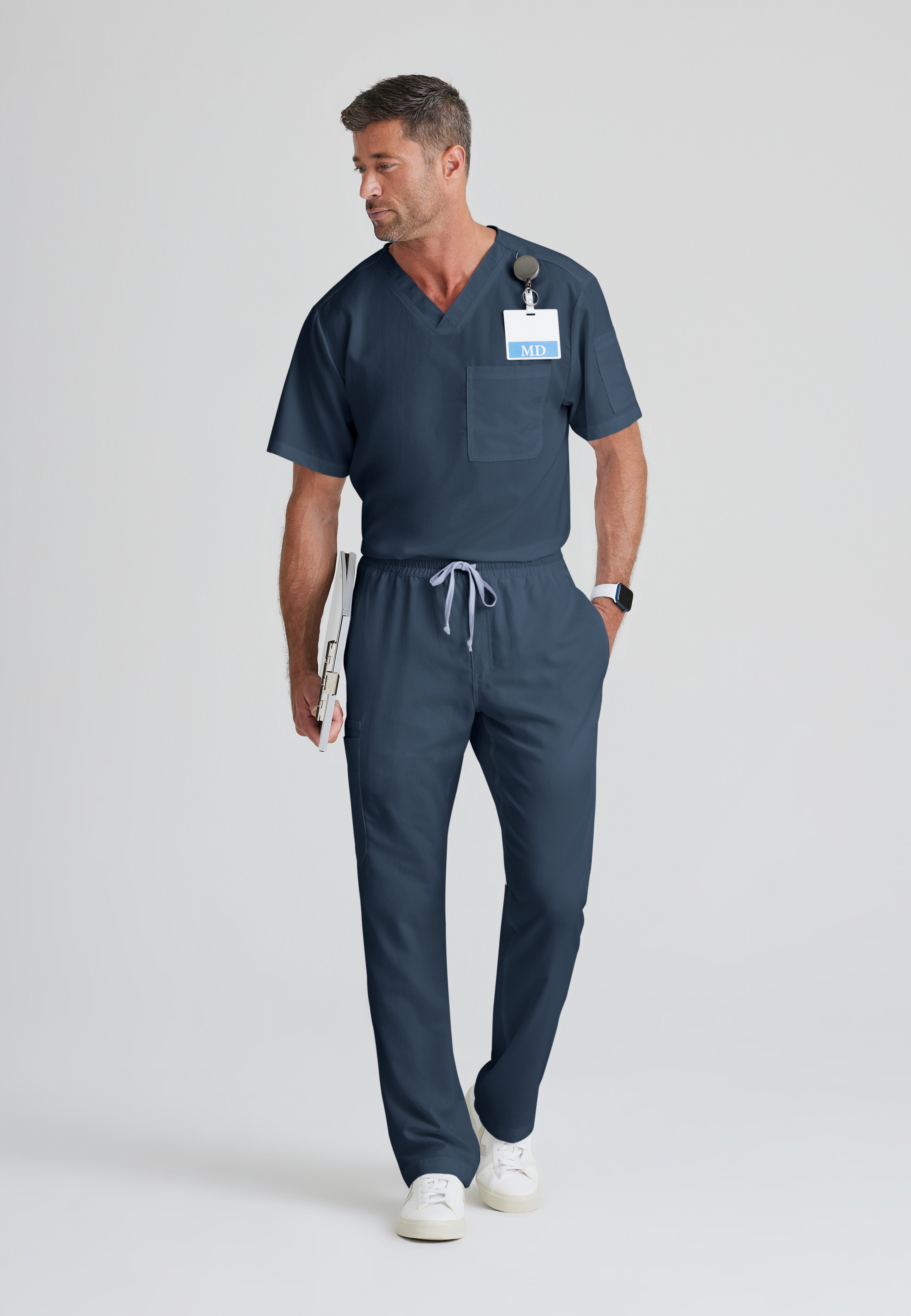 Full Body View of the Evan 2-Pocket V-Neck Scrub Top in Steel from Grey's Anatomy™ by Barco Classic