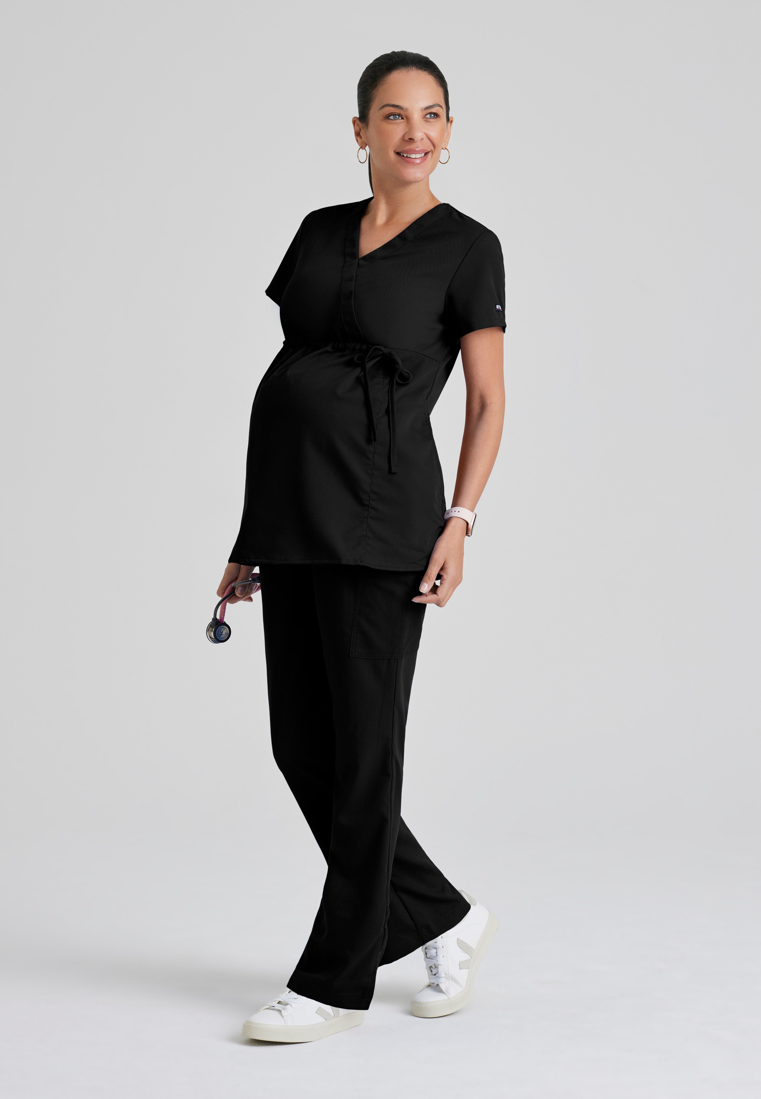 Full Body View of the Lilah 2-Pocket Mock Wrap Maternity Scrub Top in Black from Grey's Anatomy™ by Barco Classic