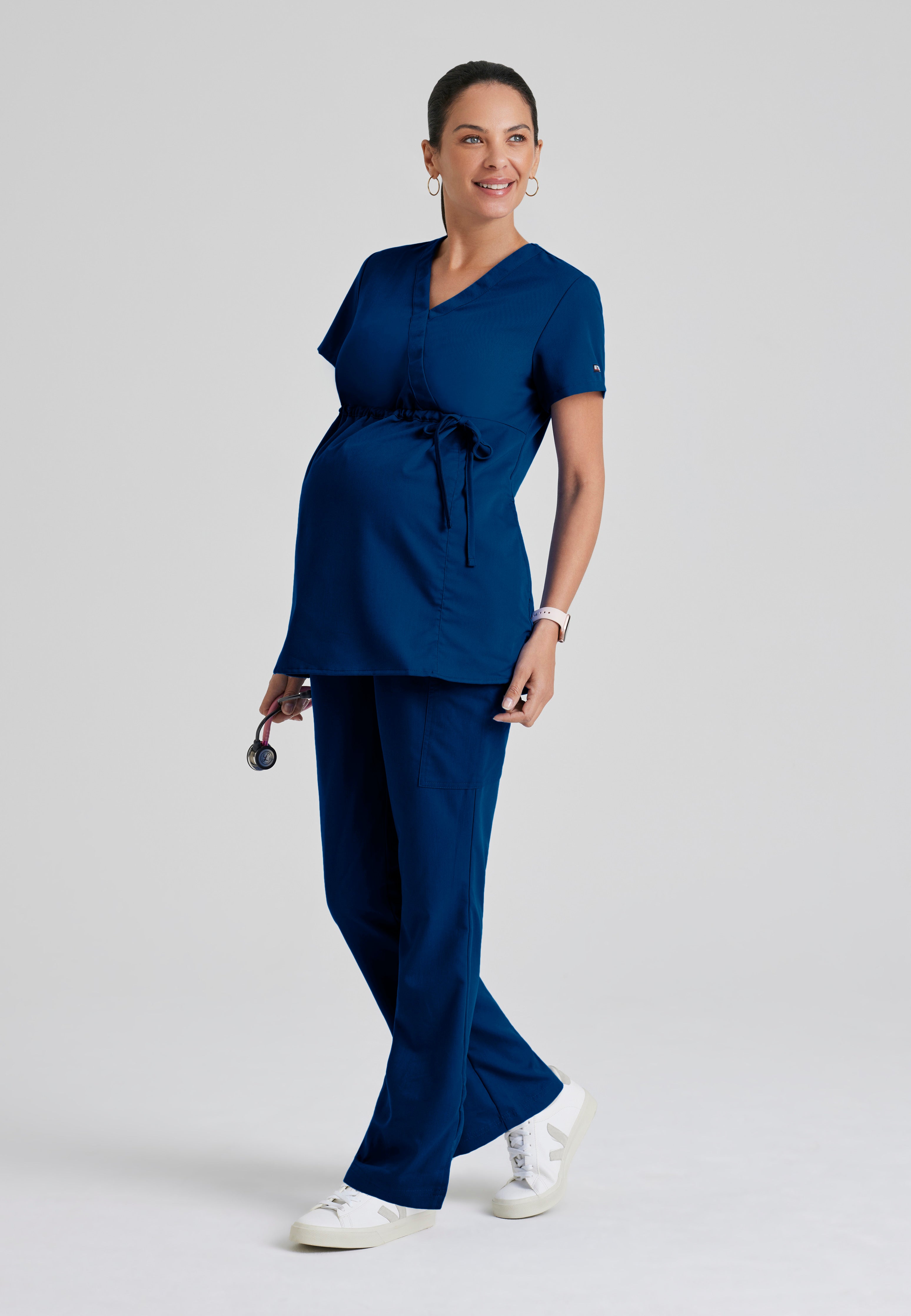 Full Body View of the Lilah 2-Pocket Mock Wrap Maternity Scrub Top in Indigo from Grey's Anatomy™ by Barco Classic