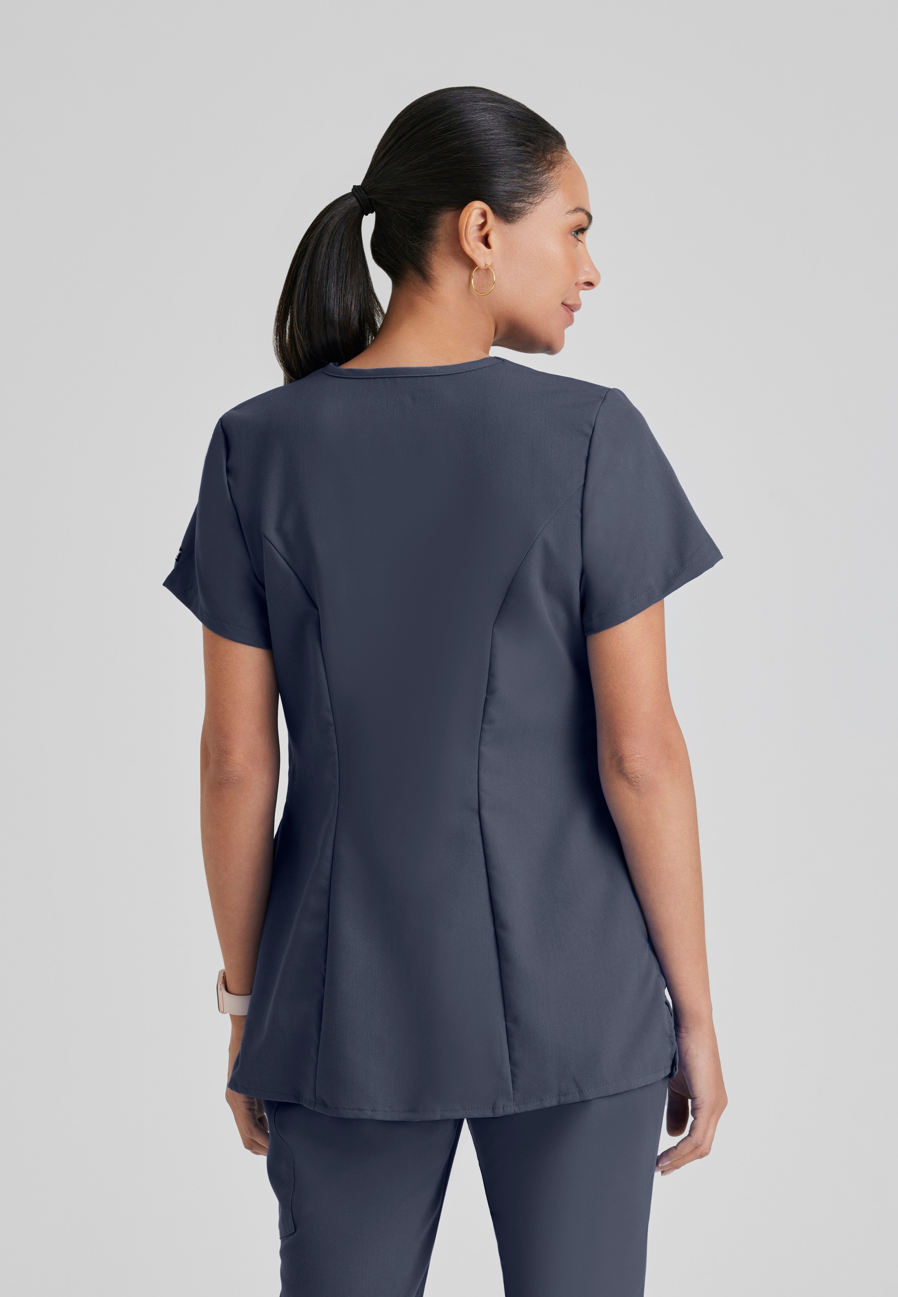 Back View of the Lilah 2-Pocket Mock Wrap Maternity Scrub Top in Steel from Grey's Anatomy™ by Barco Classic