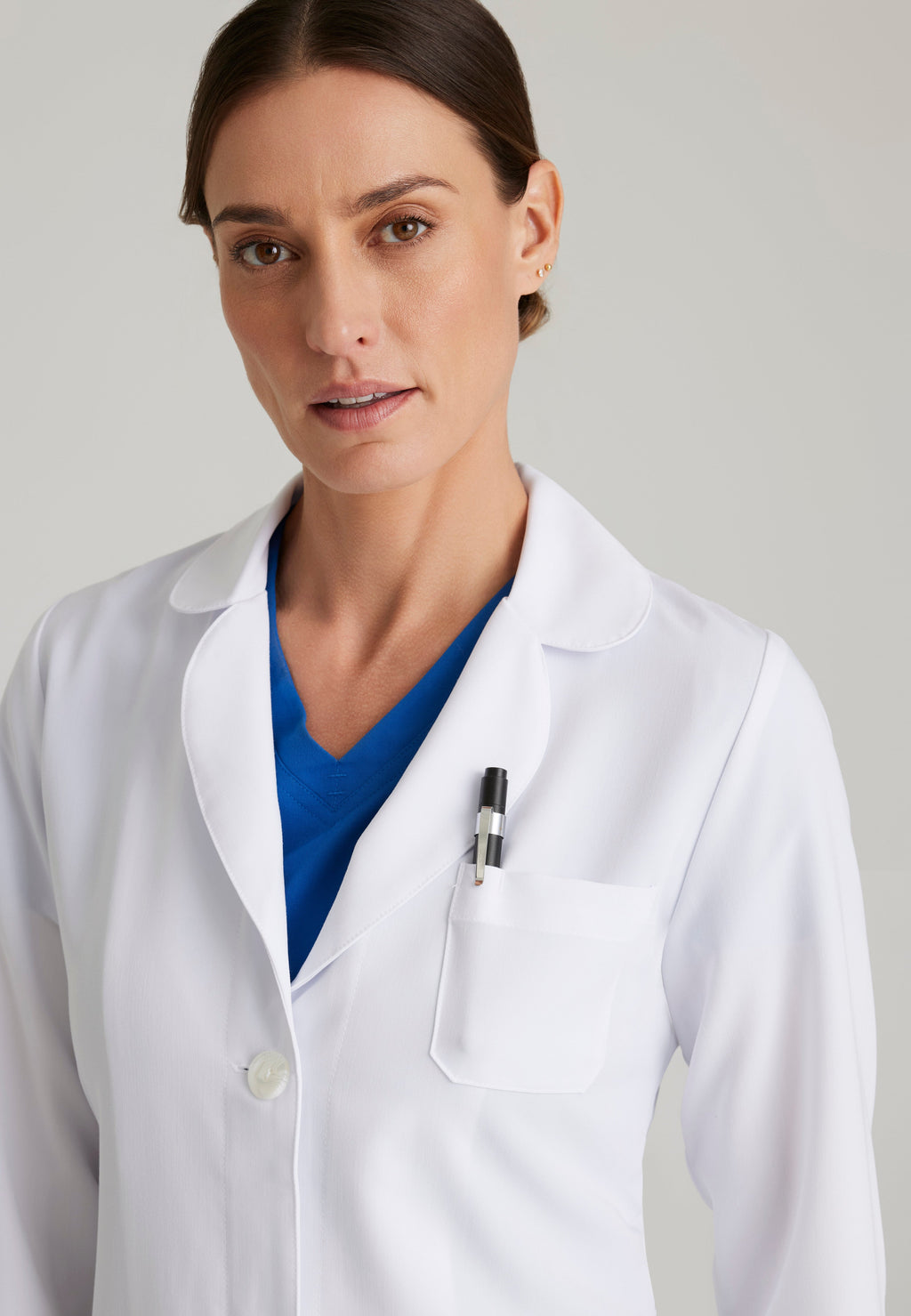 Detail Shot of the Brooke 3-Pocket 32" Lab Coat in White from Grey's Anatomy™ by Barco Signature