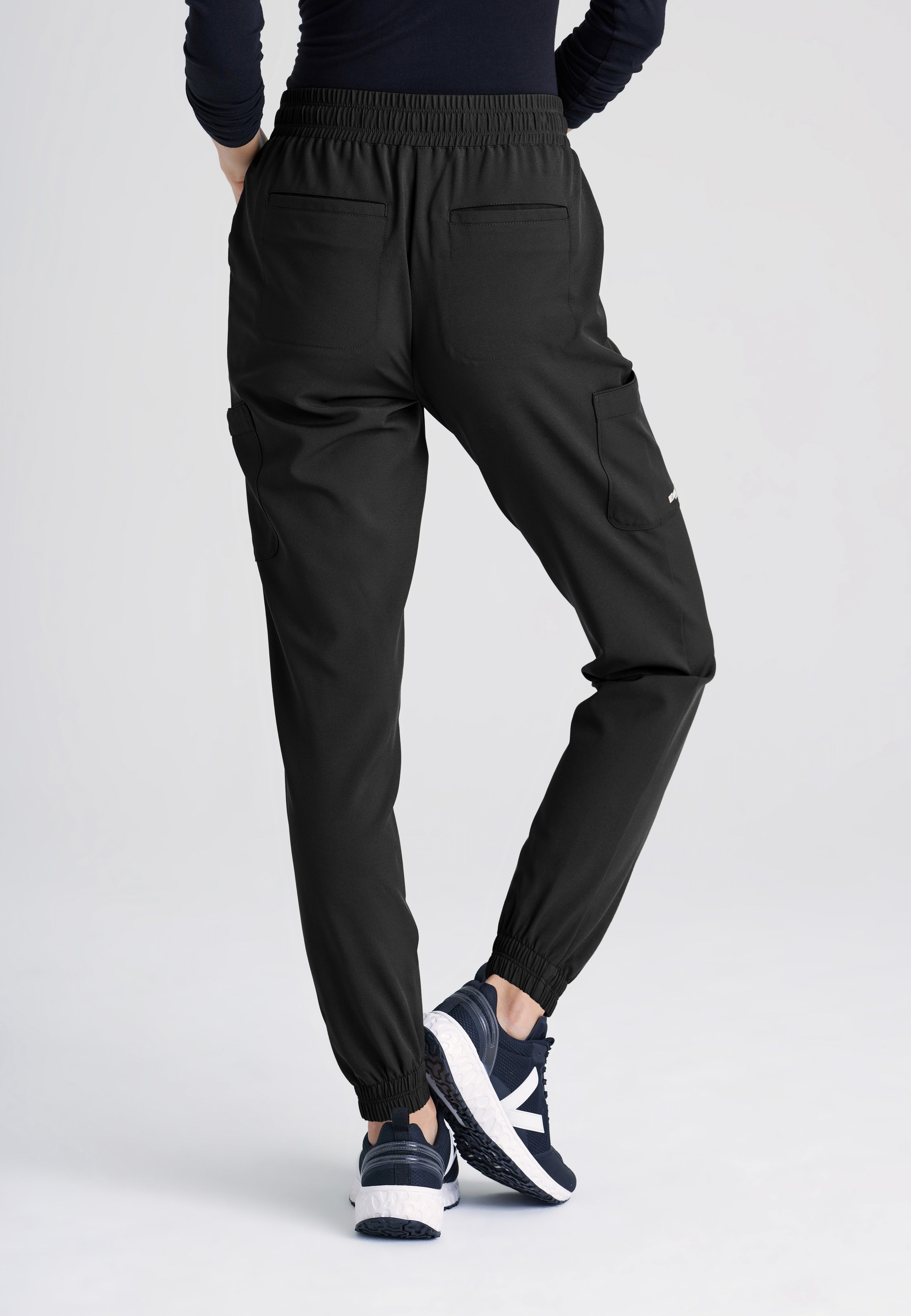 Back View of the Terra 6-Pocket Mid-Rise Ciclo® Jogger Scrub Pant in Black from Grey's Anatomy™ by Barco Evolve