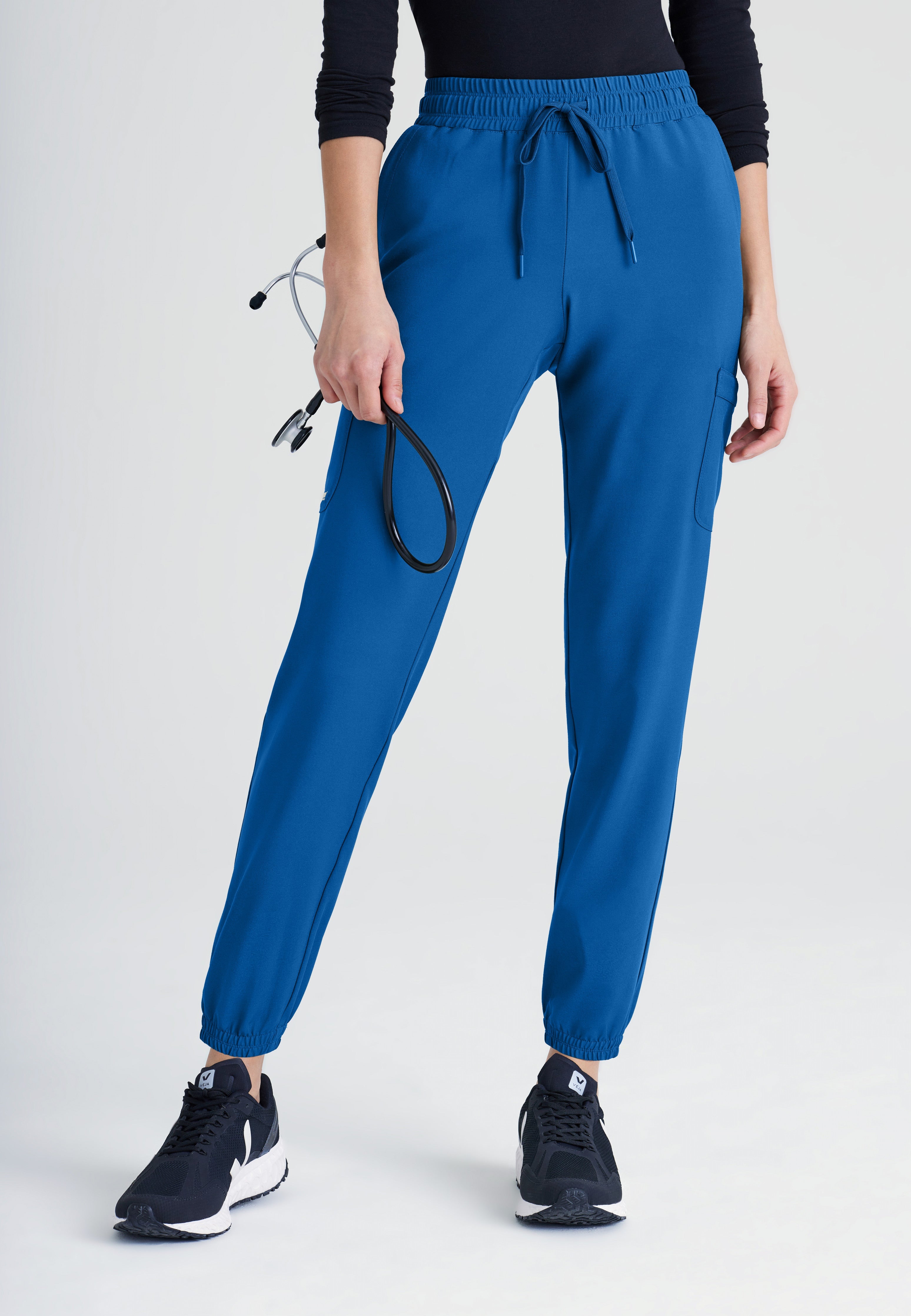 Front View of the Terra 6-Pocket Mid-Rise Ciclo® Jogger Scrub Pant in New Royal from Grey's Anatomy™ by Barco Evolve
