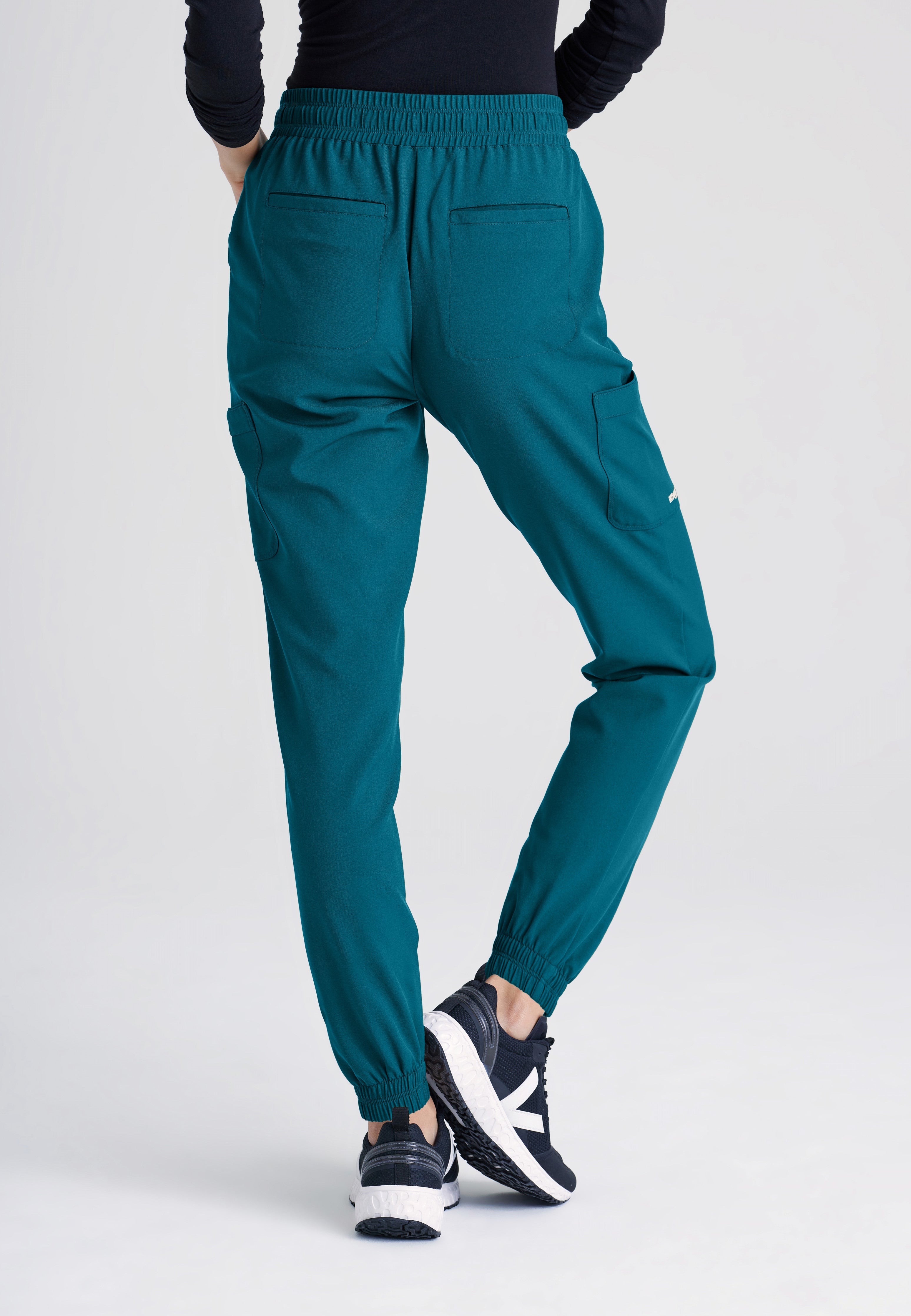 Back View of the Terra 6-Pocket Mid-Rise Ciclo® Jogger Scrub Pant in Bahama from Grey's Anatomy™ by Barco Evolve