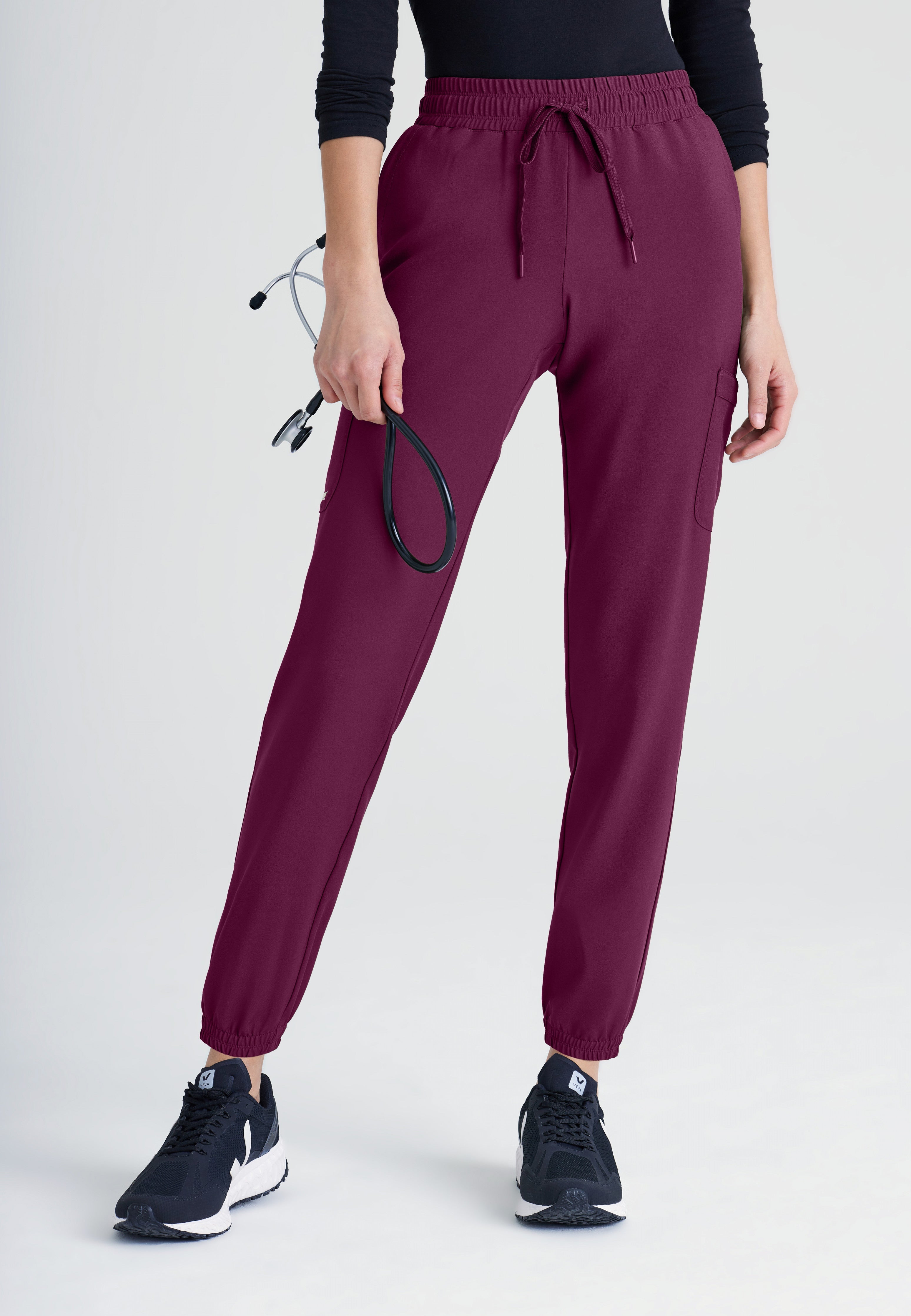 Front View of the Terra 6-Pocket Mid-Rise Ciclo® Jogger Scrub Pant in Black from Grey's Anatomy™ by Barco Evolve