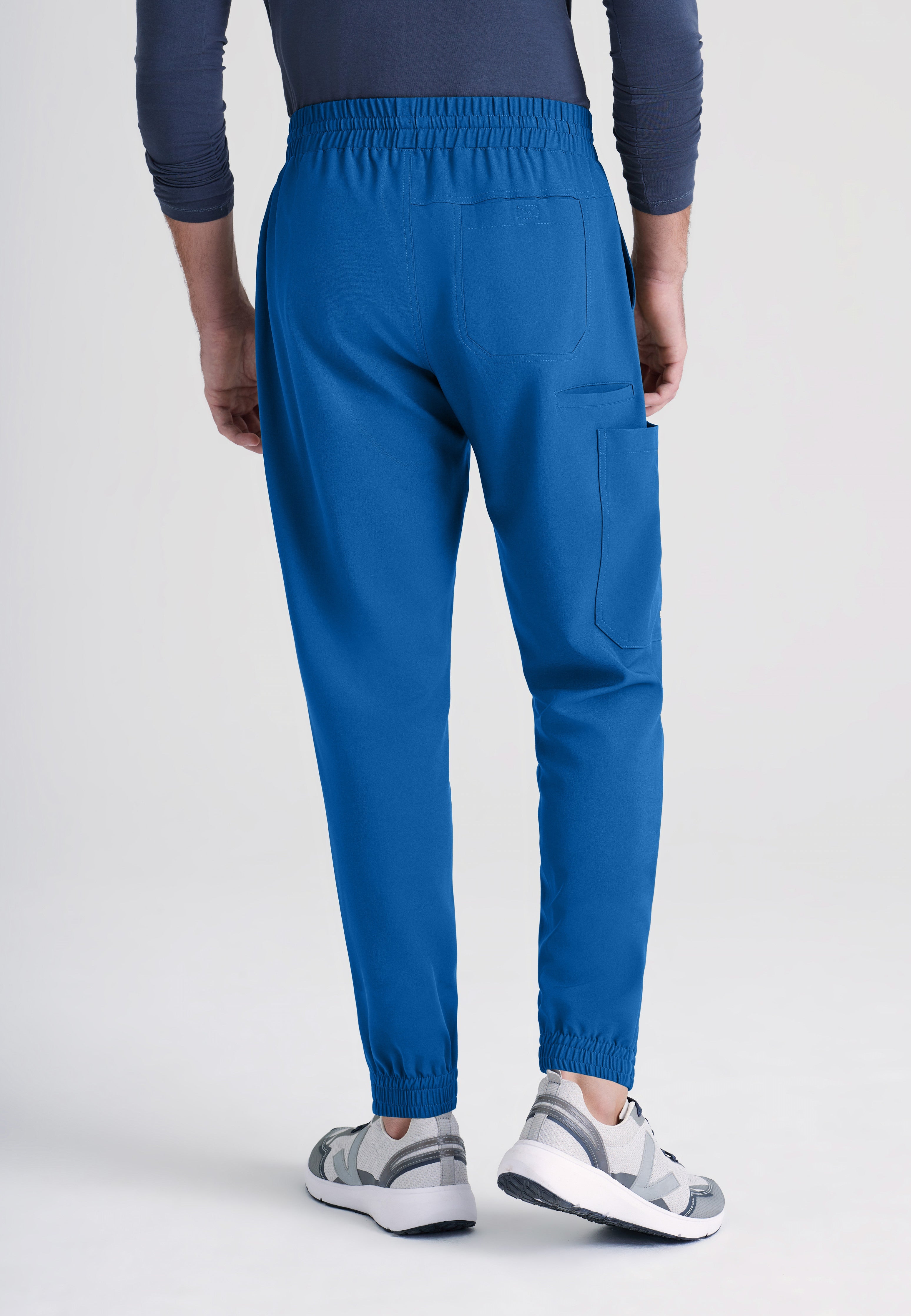 Back View of the Voyager 5-Pocket CICLO® Jogger Scrub Pant in New Royal from Grey's Anatomy™ by Barco Evolve