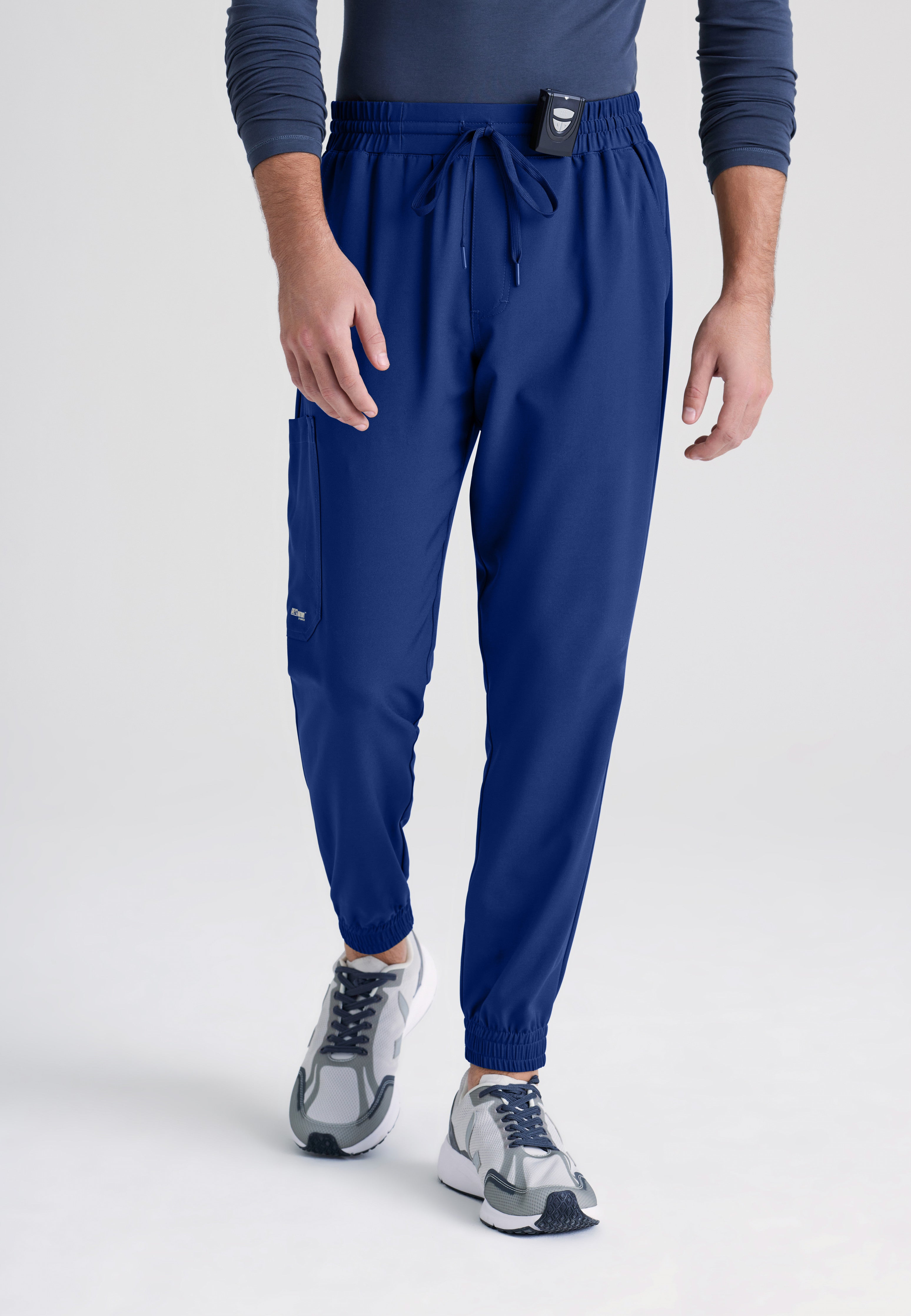 Front View of the Voyager 5-Pocket Jogger Scrub Pant in Indigo from Grey's Anatomy™ by Barco Evolve