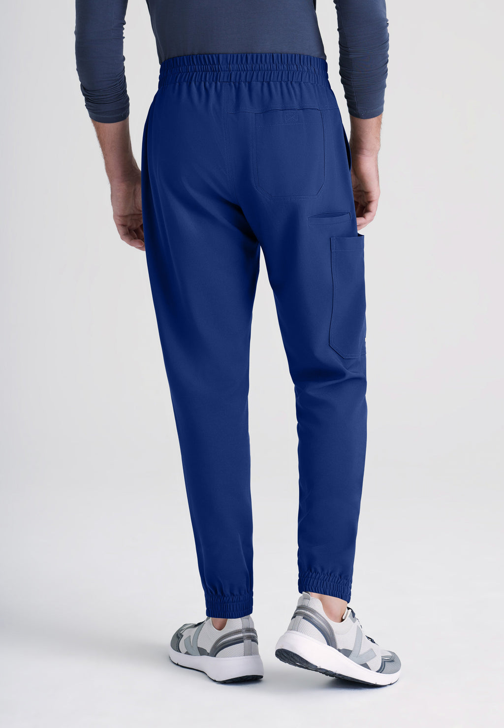 Back View of the Voyager 5-Pocket CICLO® Jogger Scrub Pant in Indigo from Grey's Anatomy™ by Barco Evolve