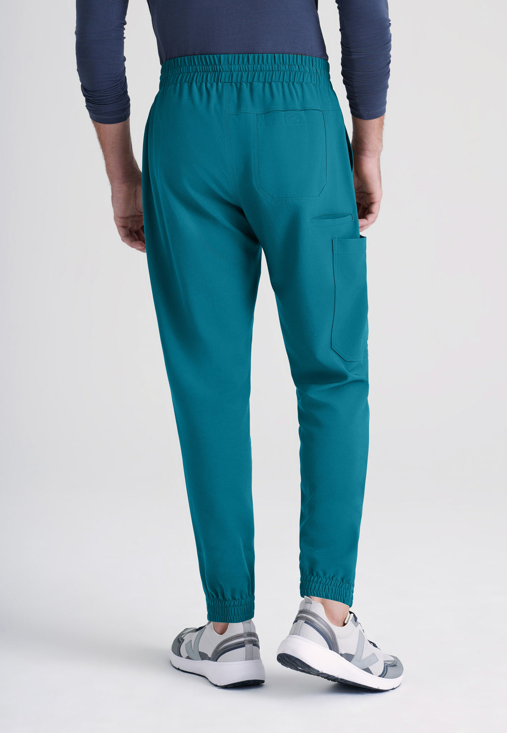 Back View of the Voyager 5-Pocket CICLO® Jogger Scrub Pant in Bahama from Grey's Anatomy™ by Barco Evolve