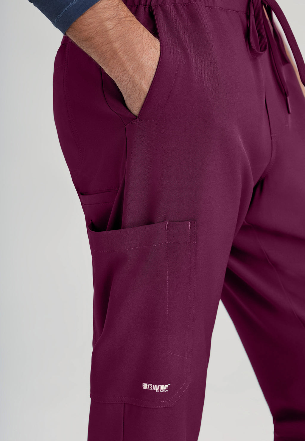 Detail Shot of the Voyager 5-Pocket CICLO® Jogger Scrub Pant in Wine from Grey's Anatomy™ by Barco Evolve
