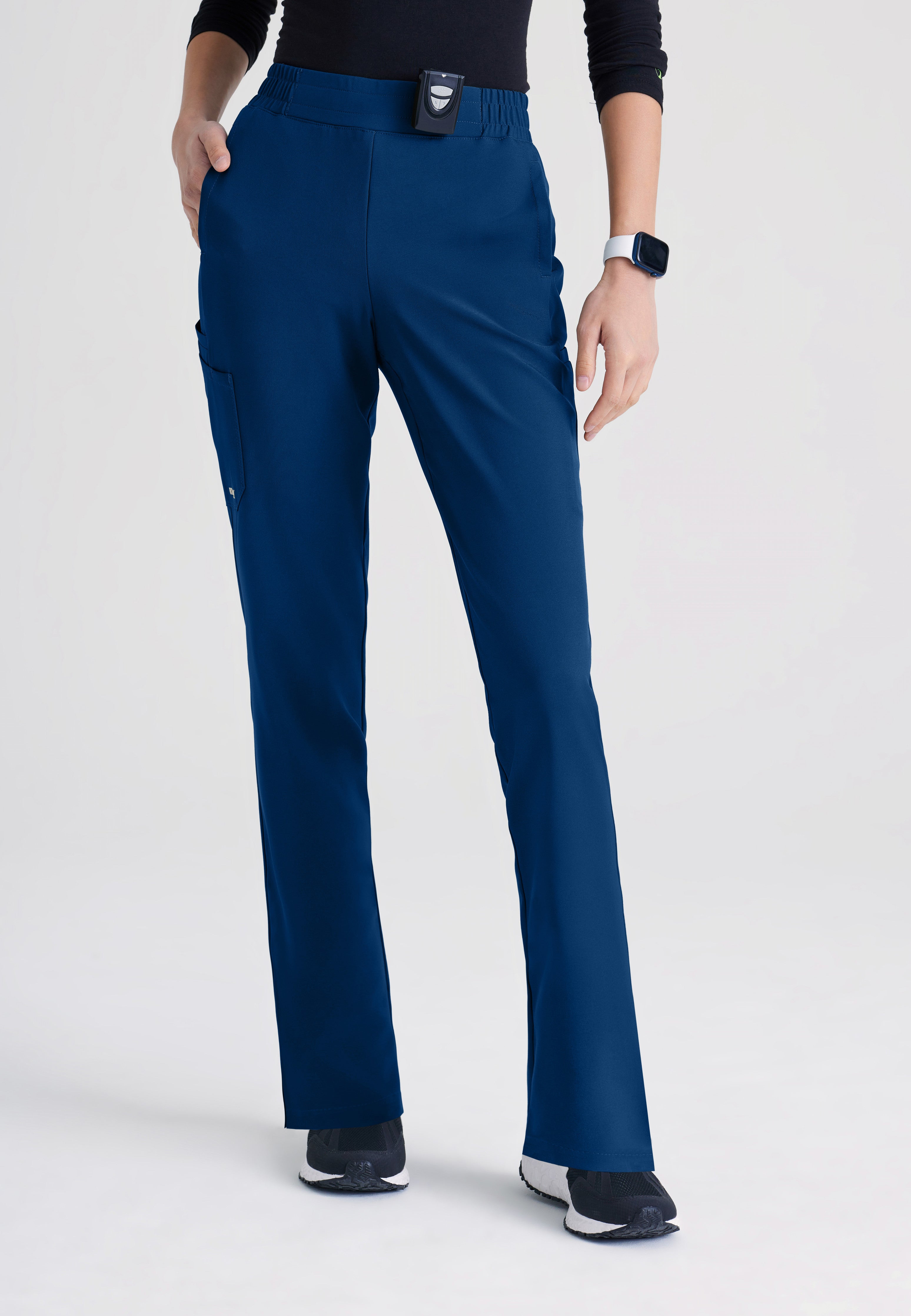 Front View of the Cosmo 6-Pocket Mid-Rise Tapered Leg Ciclo® Scrub Pant in Indigo from Grey's Anatomy™ by Barco Evolve