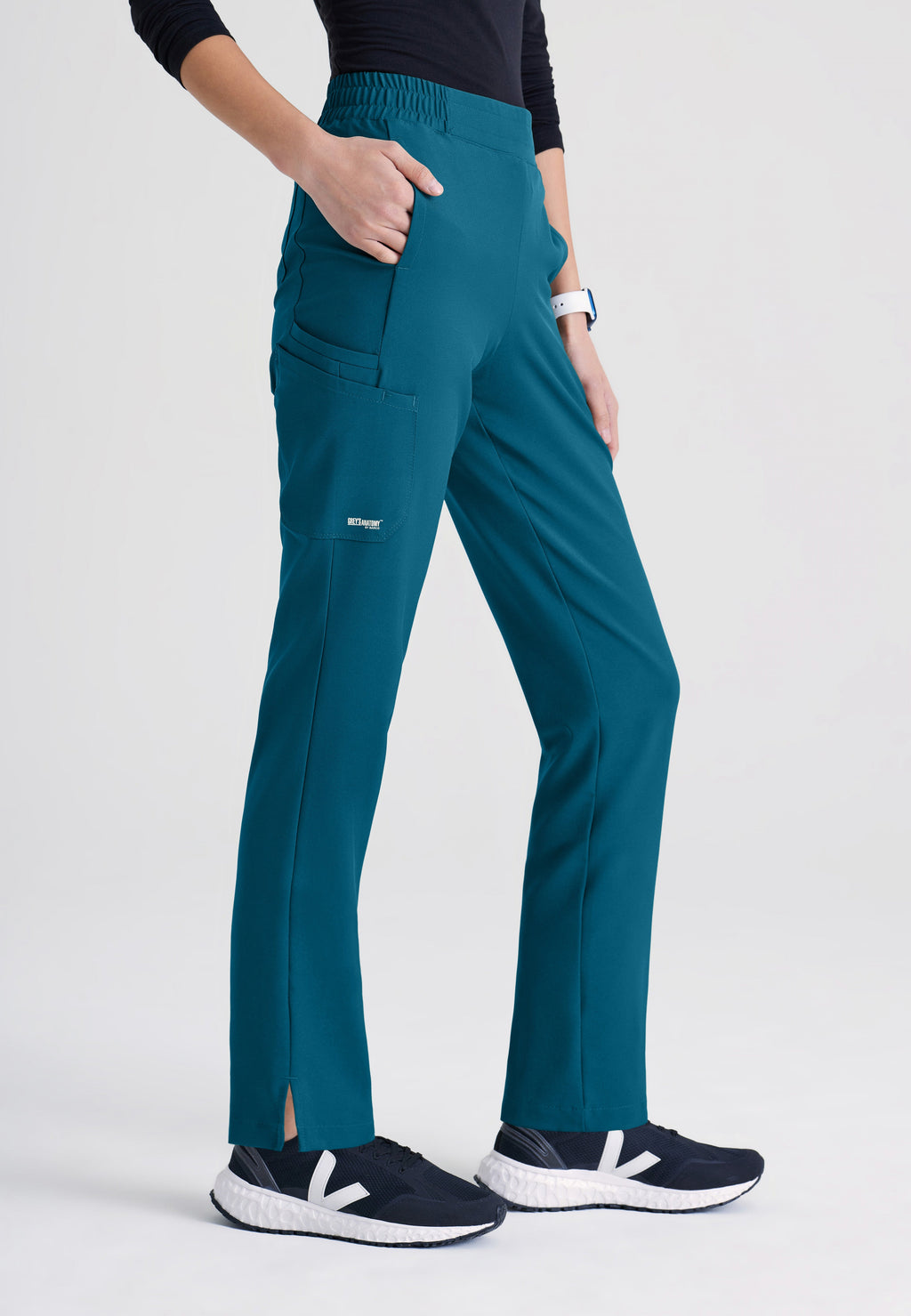 Side View of the Cosmo 6-Pocket Mid-Rise Tapered Leg Ciclo® Scrub Pant in Bahama from Grey's Anatomy™ by Barco Evolve