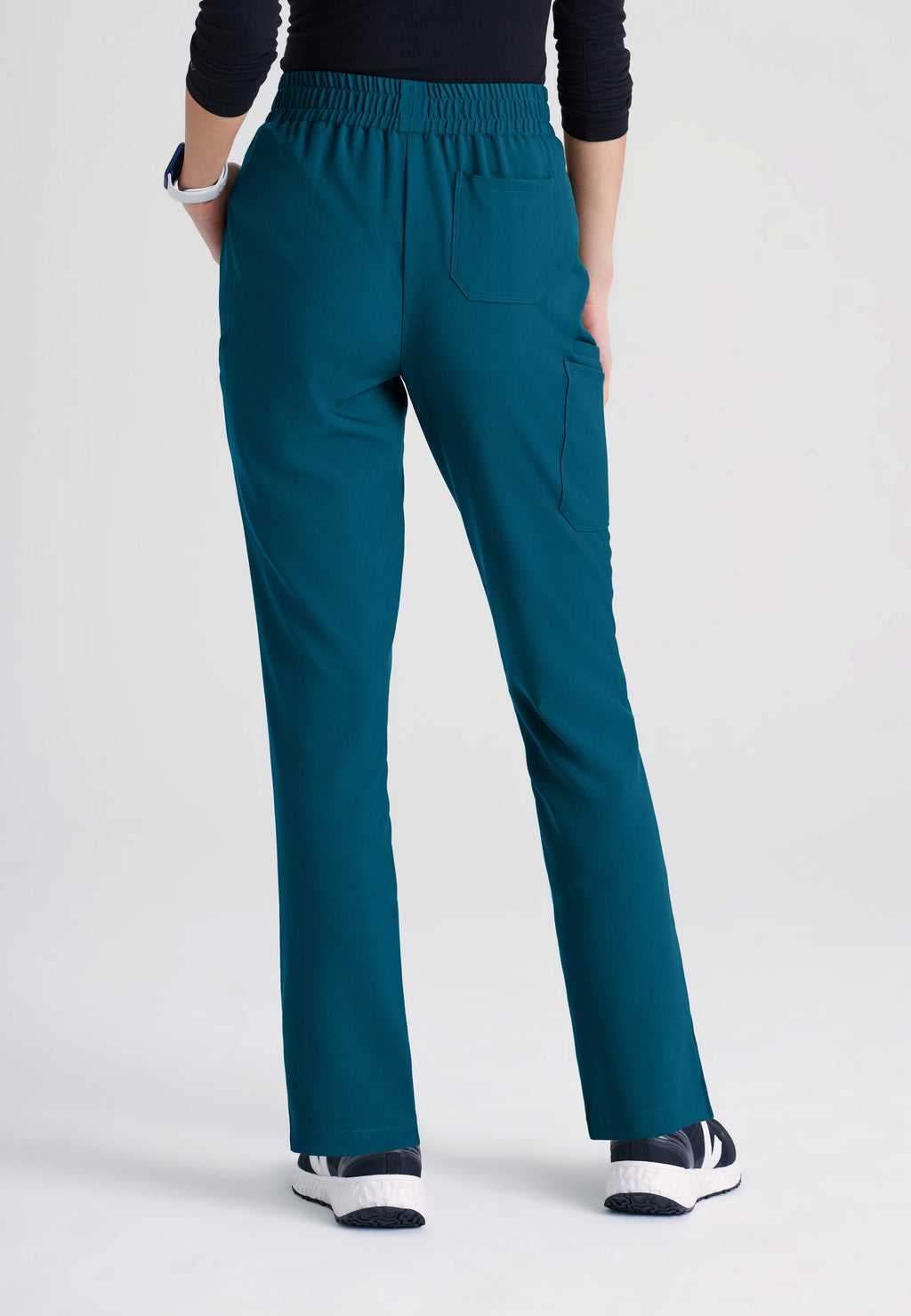 Back View of the Cosmo 6-Pocket Mid-Rise Tapered Leg Ciclo® Scrub Pant in Bahama from Grey's Anatomy™ by Barco Evolve