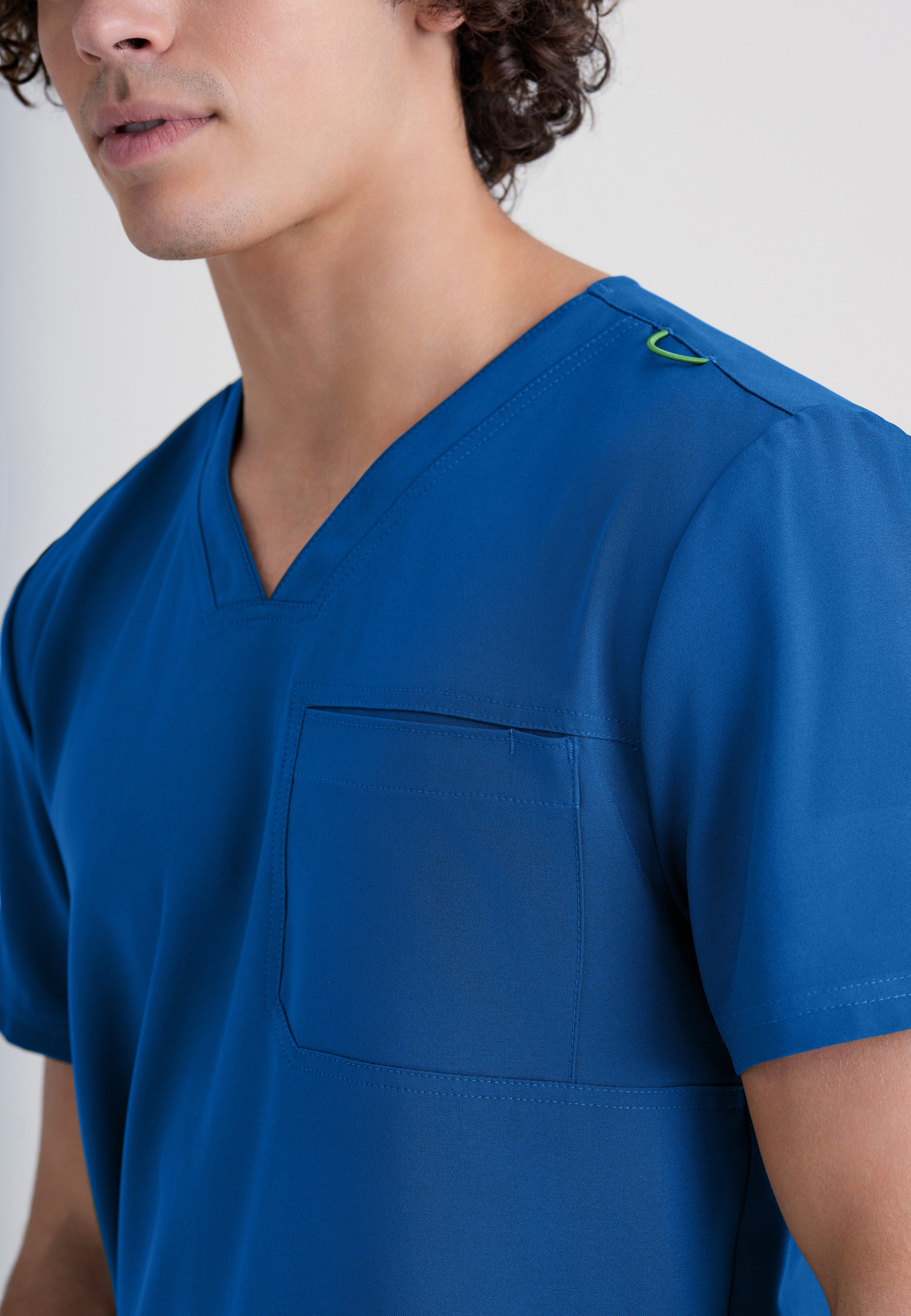 Detail Shot of the Journey 1-Pocket Ciclo® Scrub Top in New Royal from Grey's Anatomy™ by Barco Evolve