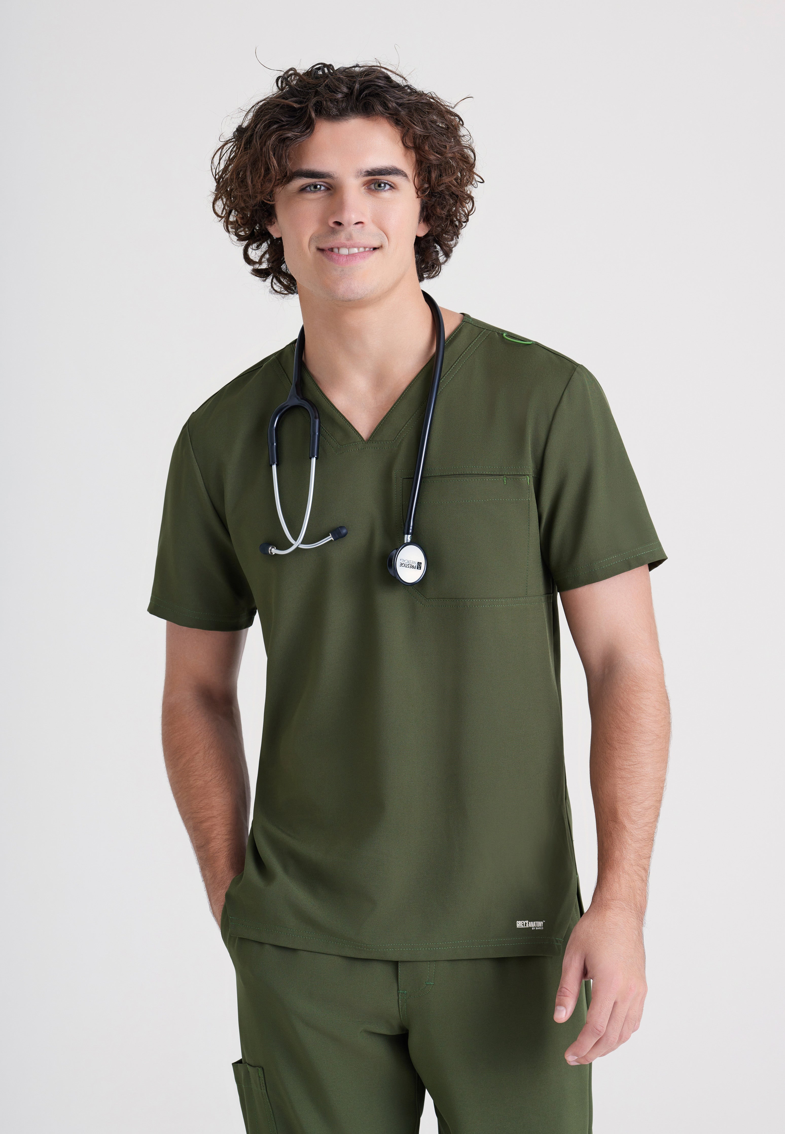 Front View of the Journey 1-Pocket Ciclo® Scrub Top in Indigo from Grey's Anatomy™ by Barco Evolve