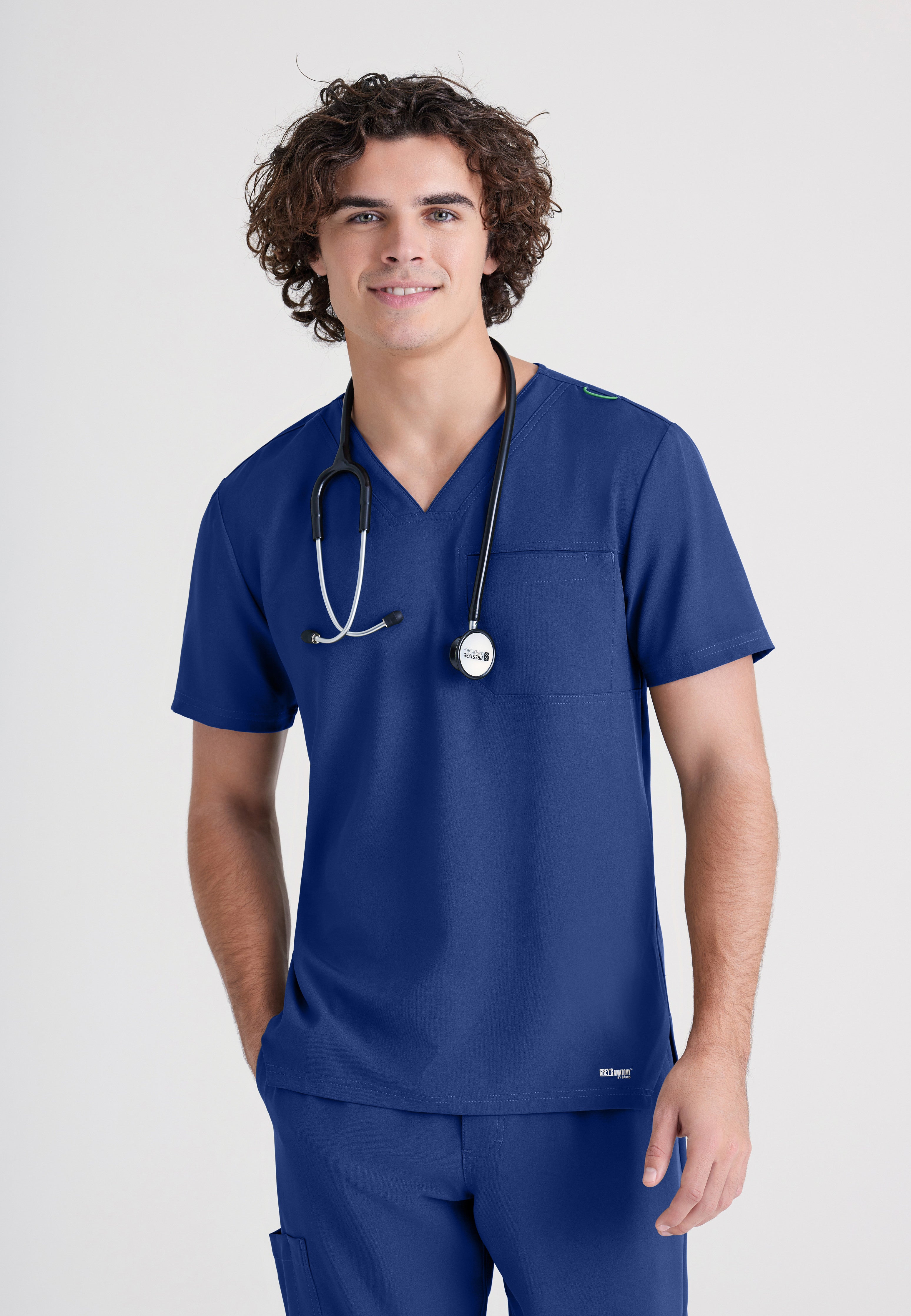 Front View of the Journey 1-Pocket Ciclo® Scrub Top in Indigo from Grey's Anatomy™ by Barco Evolve