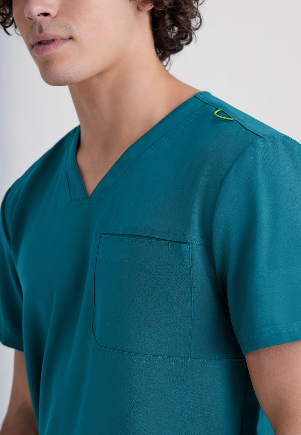 Detail Shot of the Journey 1-Pocket Ciclo® Scrub Top in Bahama from Grey's Anatomy™ by Barco Evolve