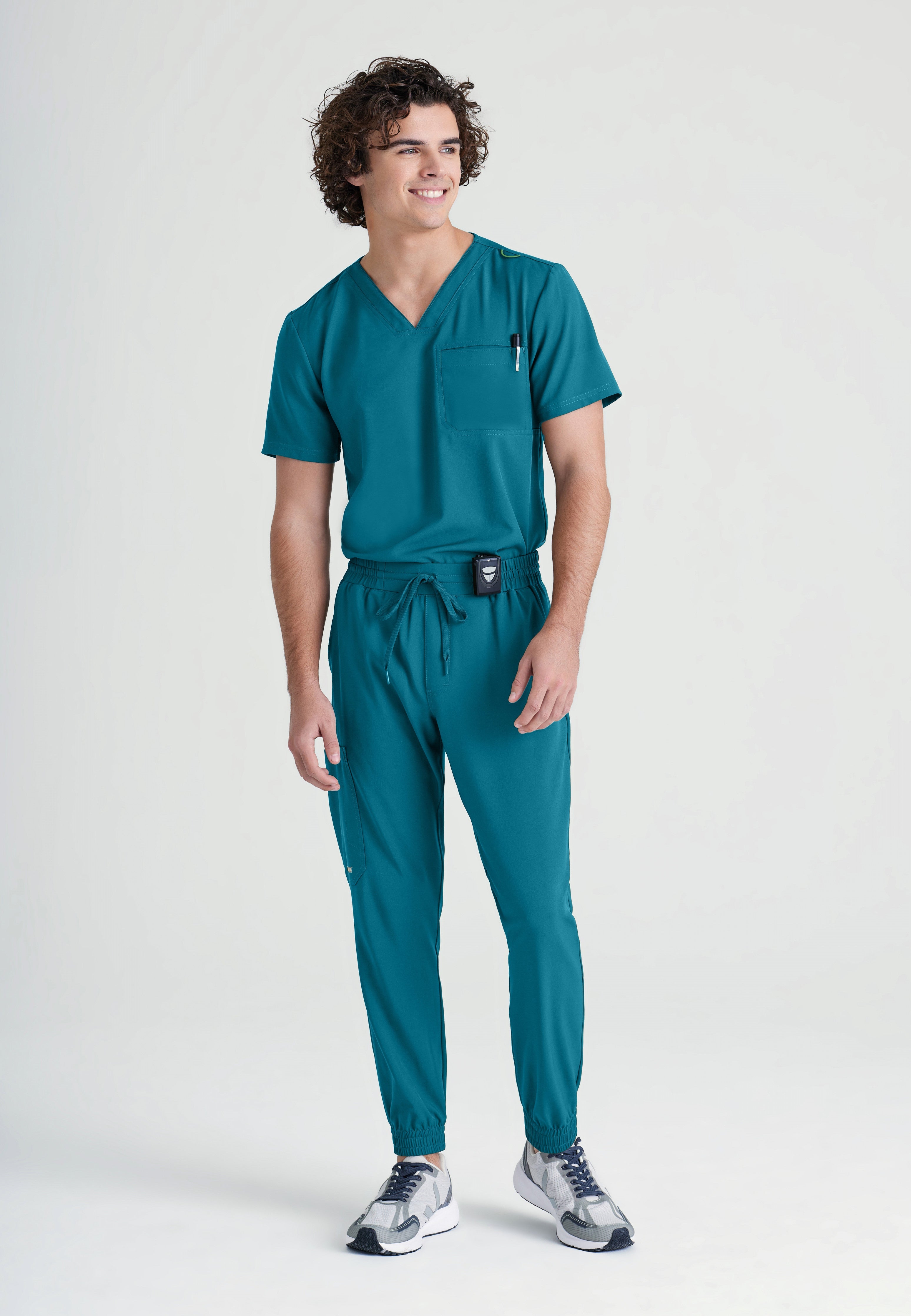 Full Body View of the Voyager 5-Pocket CICLO® Jogger Scrub Pant in Bahama from Grey's Anatomy™ by Barco Evolve