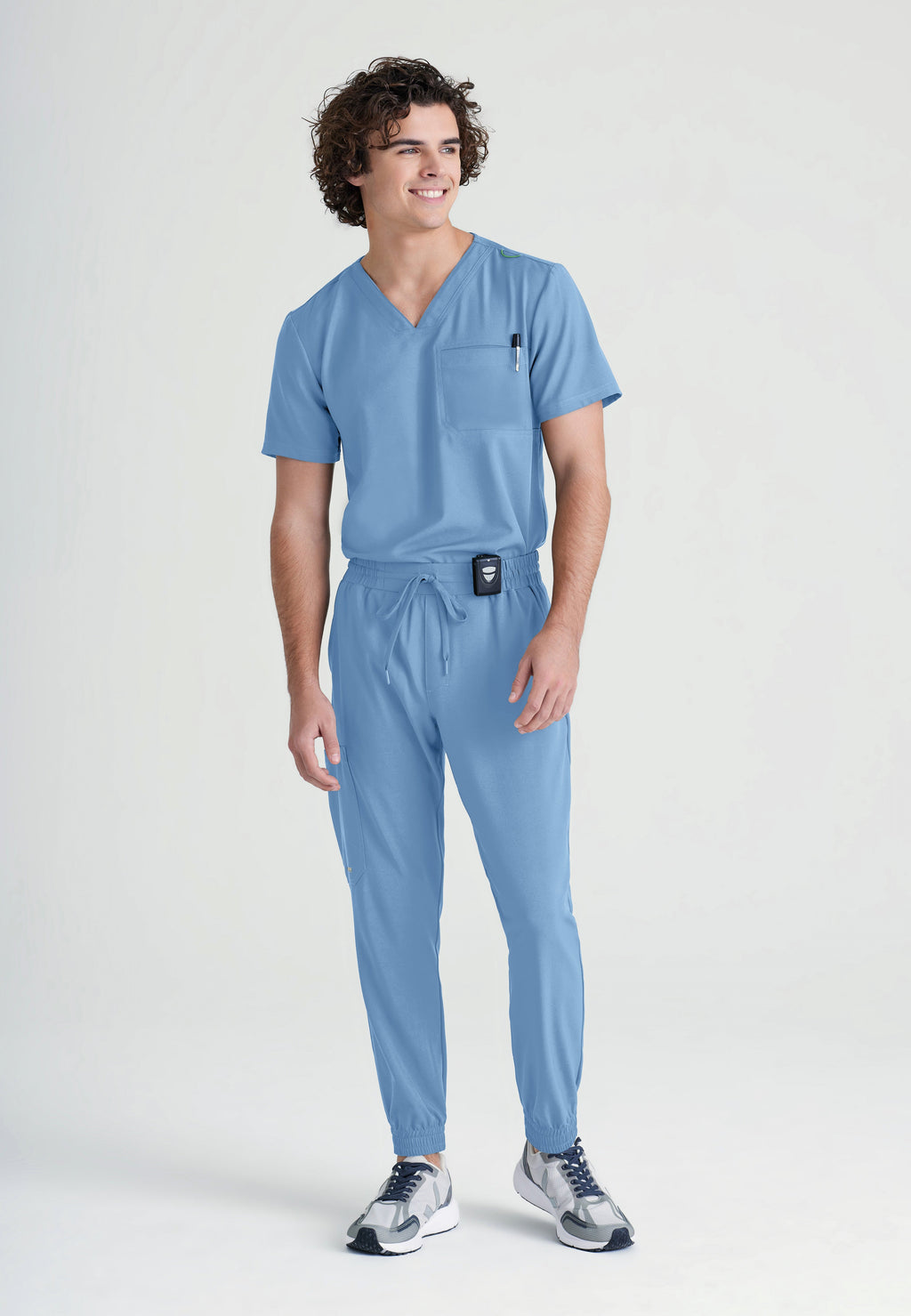 Full Body View of the Journey 1-Pocket Ciclo® Scrub Top in Ciel Blue from Grey's Anatomy™ by Barco Evolve