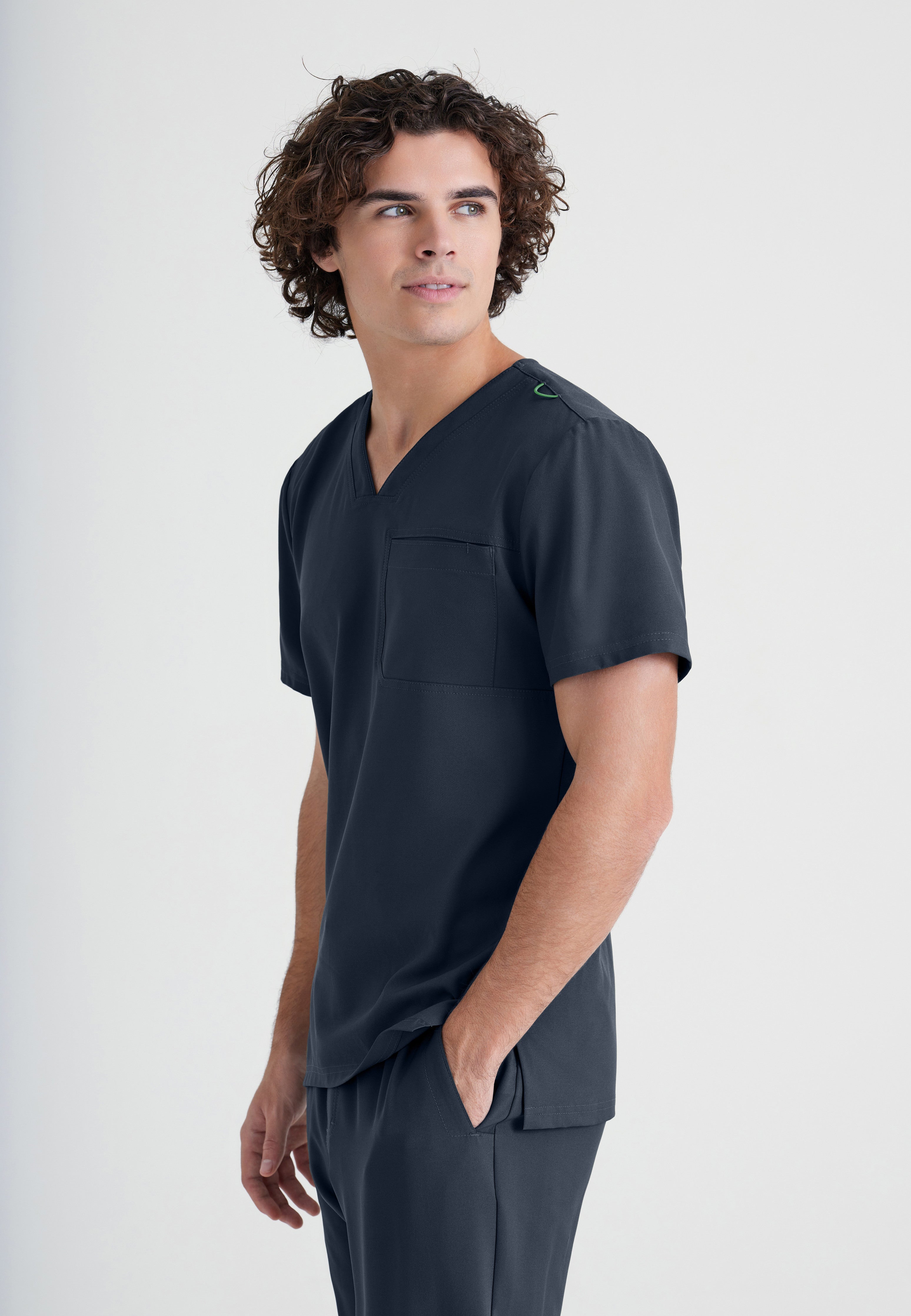 Side View of the Journey 1-Pocket Ciclo® Scrub Top in Steel from Grey's Anatomy™ by Barco Evolve