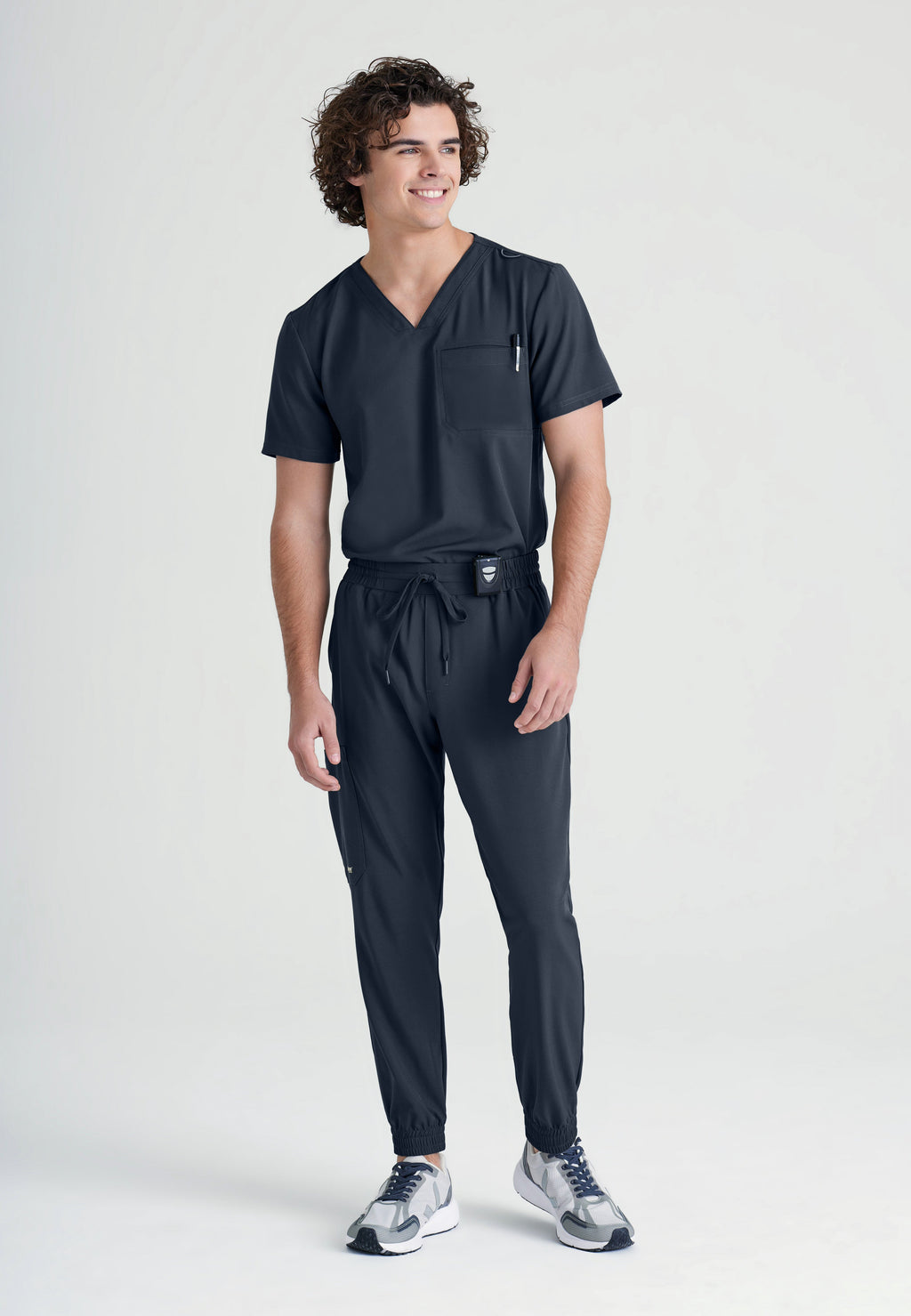 Full Body View of the Voyager 5-Pocket CICLO® Jogger Scrub Pant in Steel from Grey's Anatomy™ by Barco Evolve