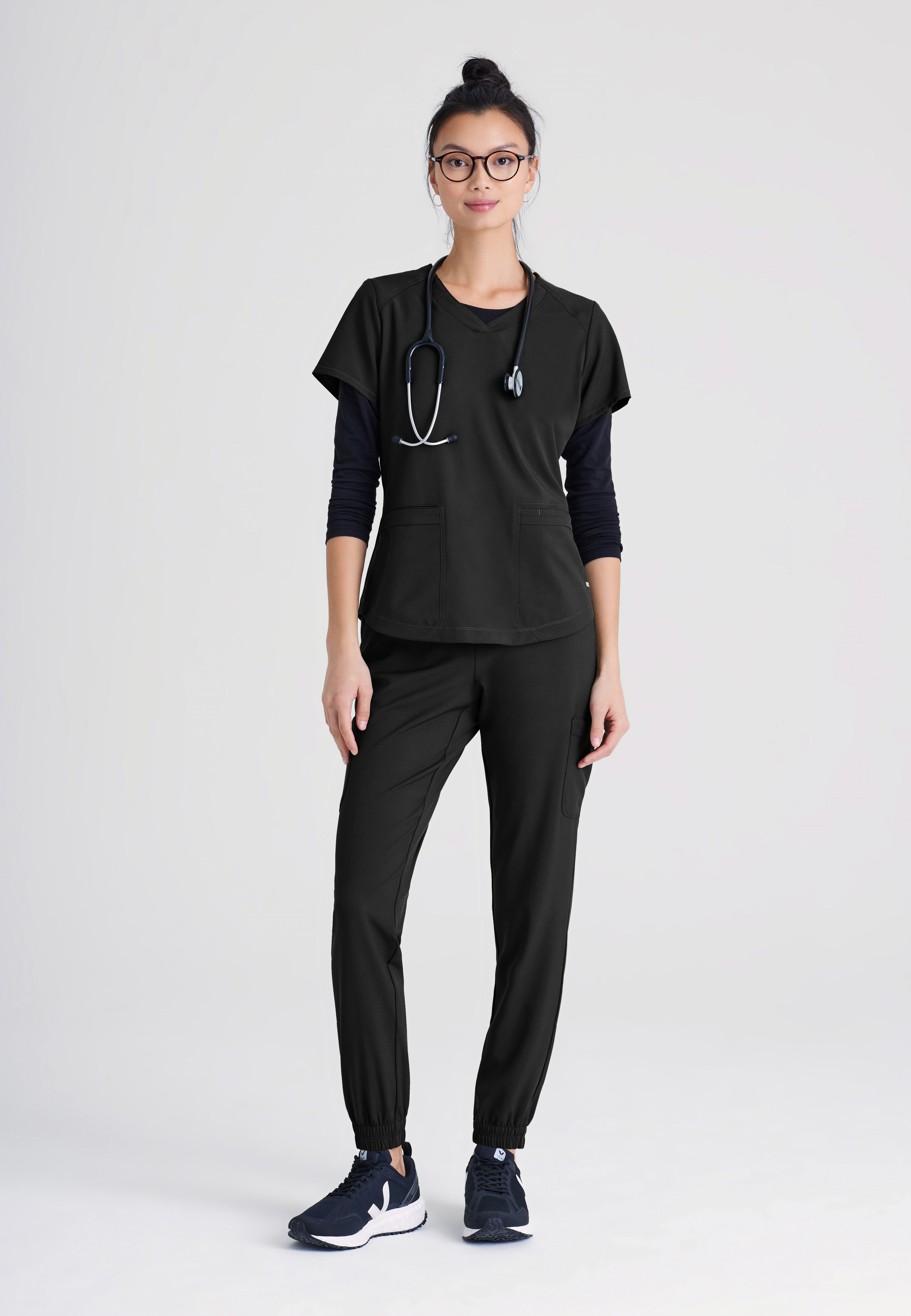 Full Body View of the Terra 6-Pocket Mid-Rise Ciclo® Jogger Scrub Pant in Black from Grey's Anatomy™ by Barco Evolve