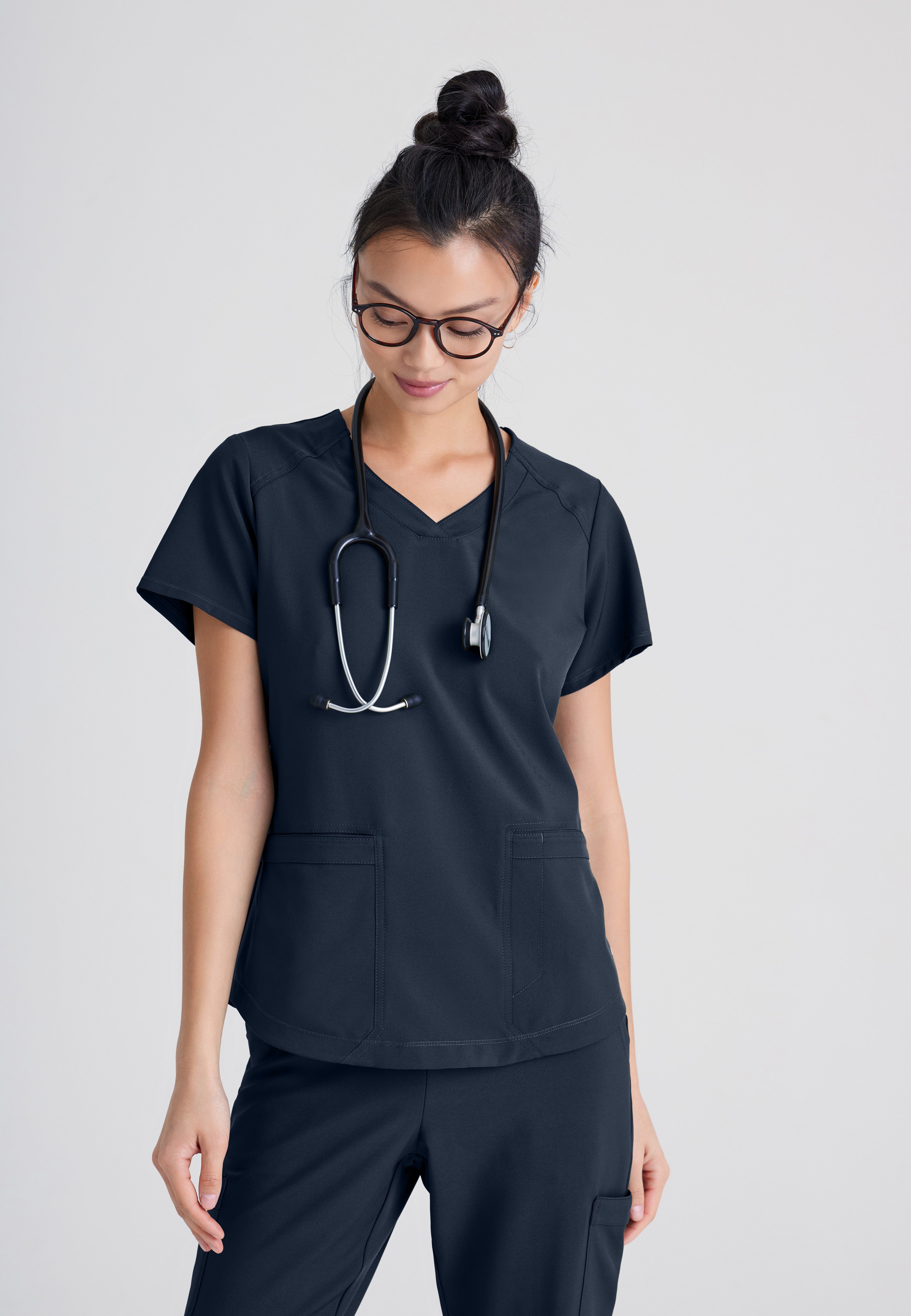 Front View of the Rhythm 2-Pocket Ciclo® Scrub Top in Steel from Grey's Anatomy™ by Barco Evolve