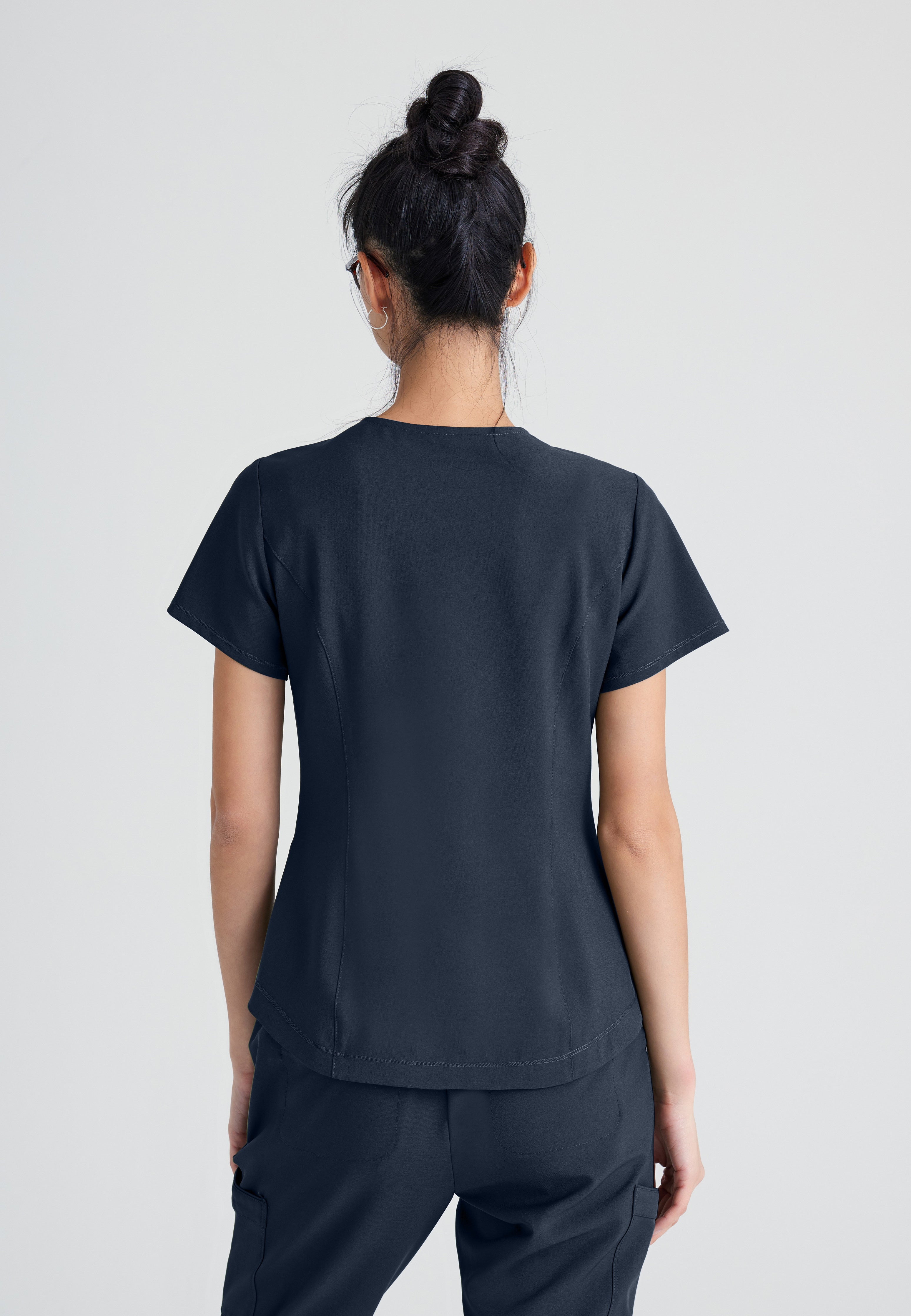 Back View of the Rhythm 2-Pocket Ciclo® Scrub Top in Steel from Grey's Anatomy™ by Barco Evolve
