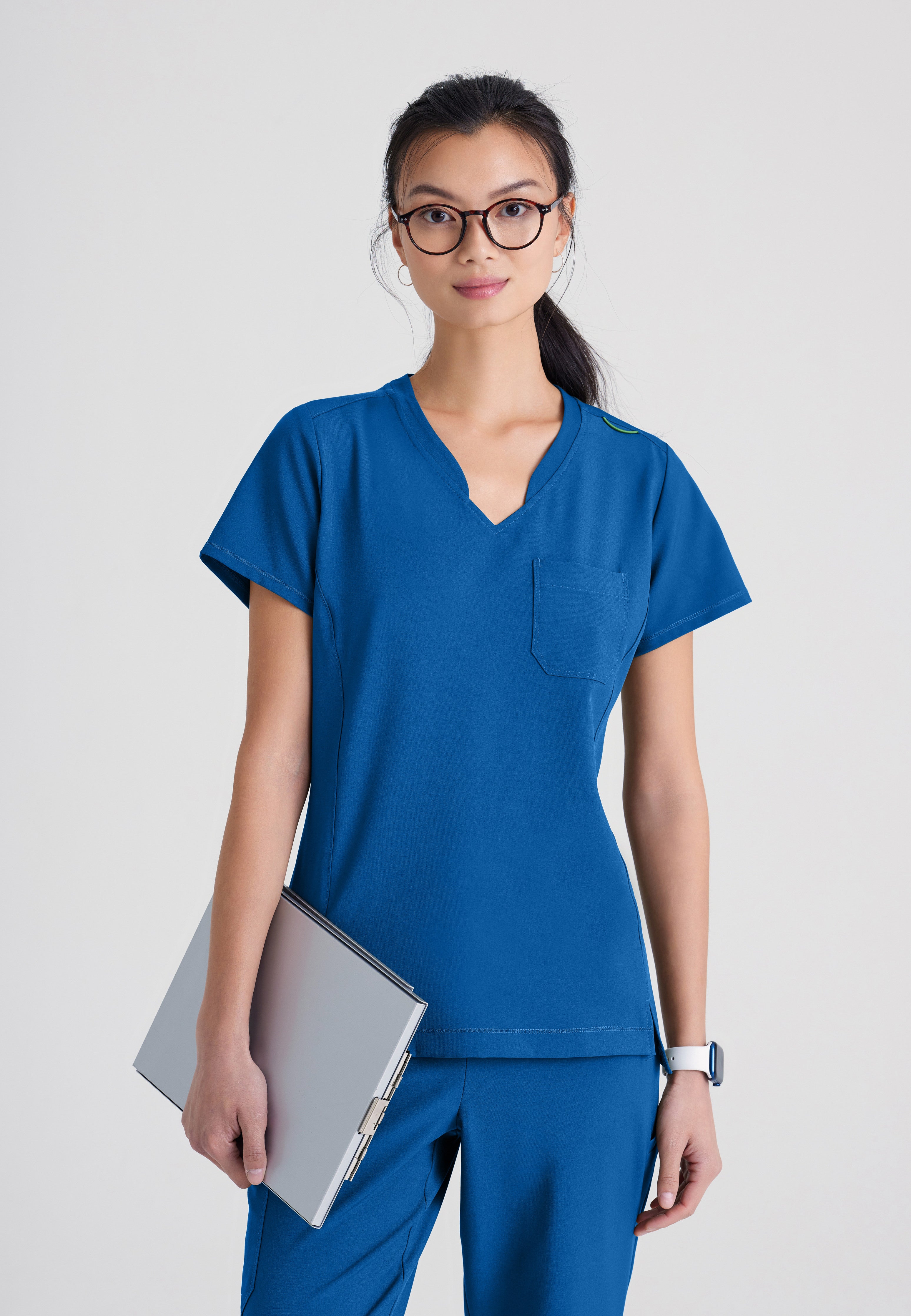 Front View of the Sway 1-Pocket Banded V-Neck Ciclo® Scrub Top in Black from Grey's Anatomy™ by Barco Evolve