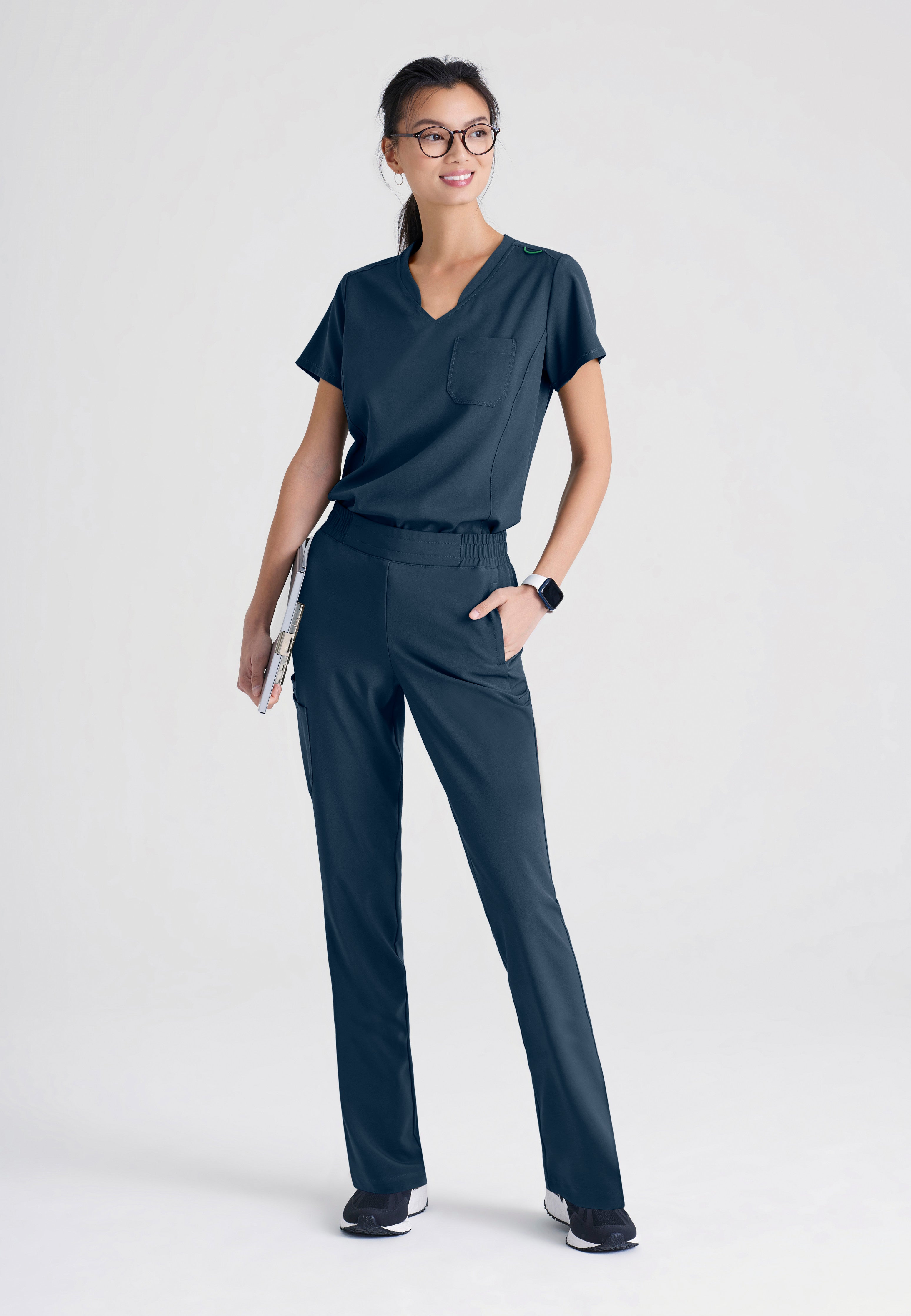 Full Body View of the Sway 1-Pocket Banded V-Neck Ciclo® Scrub Top in Steel from Grey's Anatomy™ by Barco Evolve