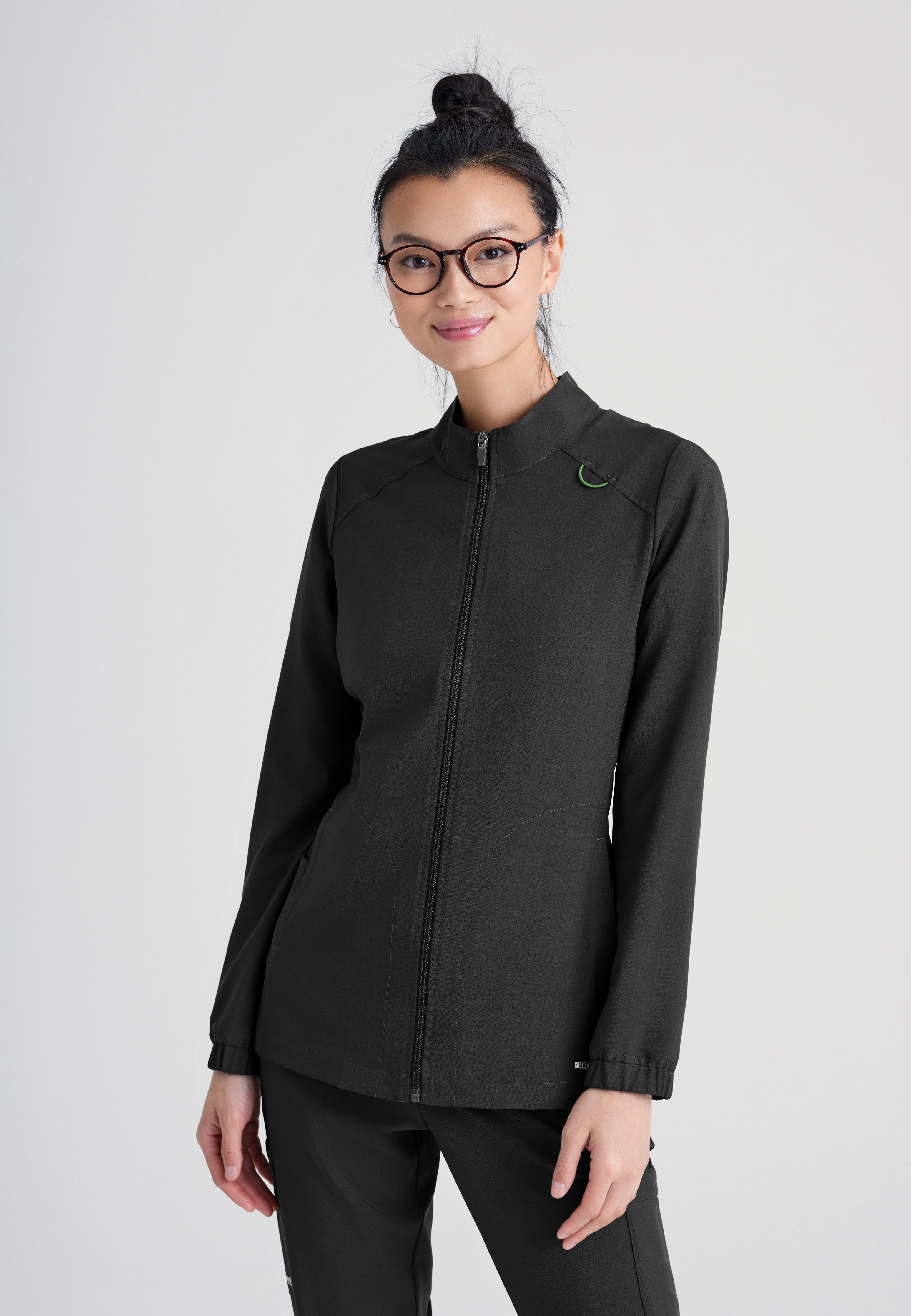 Front View of the Virtue 3-Pocket Stand-Up Collar Ciclo® Scrub Jacket in Black from Grey's Anatomy™ by Barco Evolve