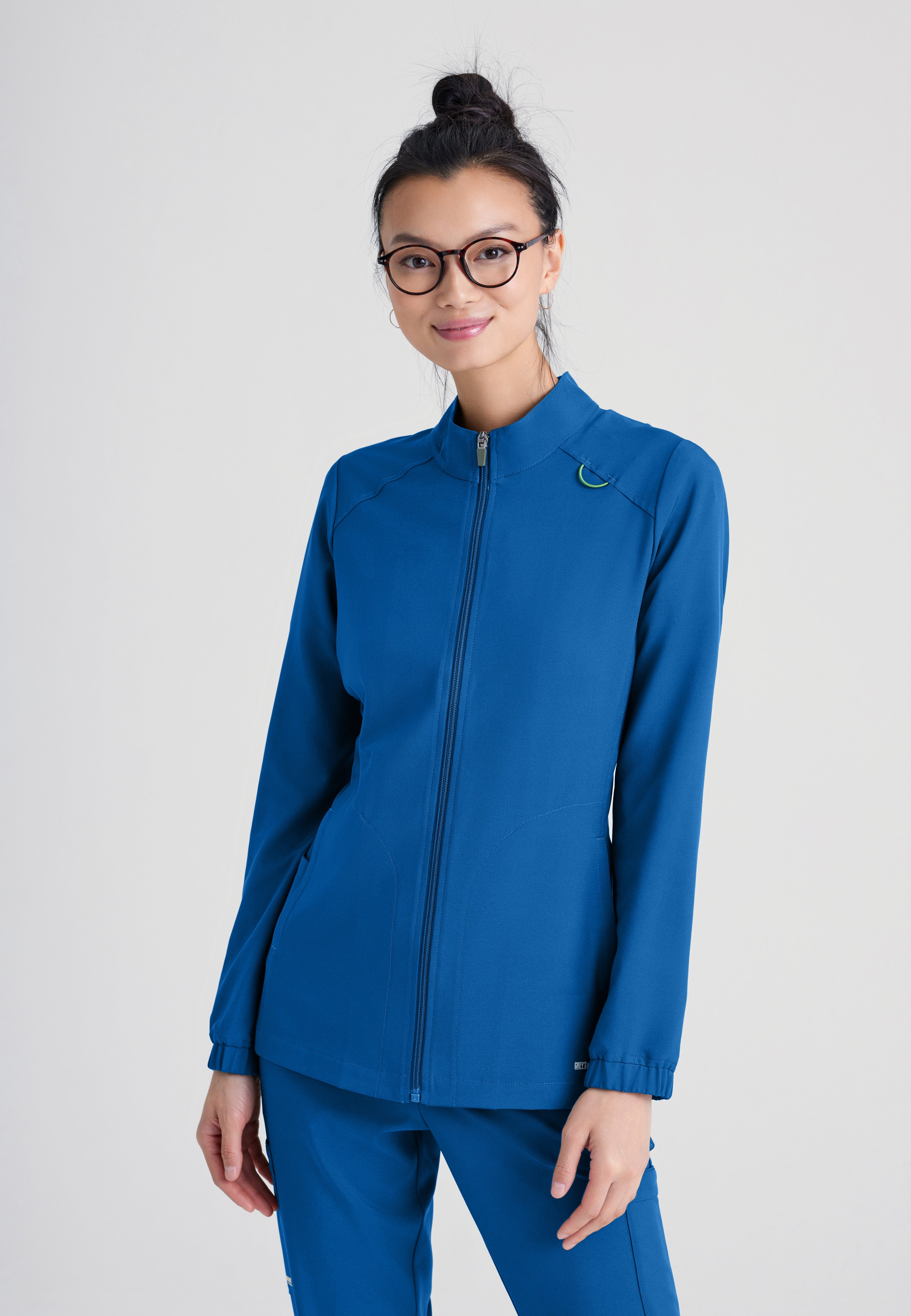 Front View of the Virtue 3-Pocket Stand-Up Collar Ciclo® Scrub Jacket in New Royal from Grey's Anatomy™ by Barco Evolve