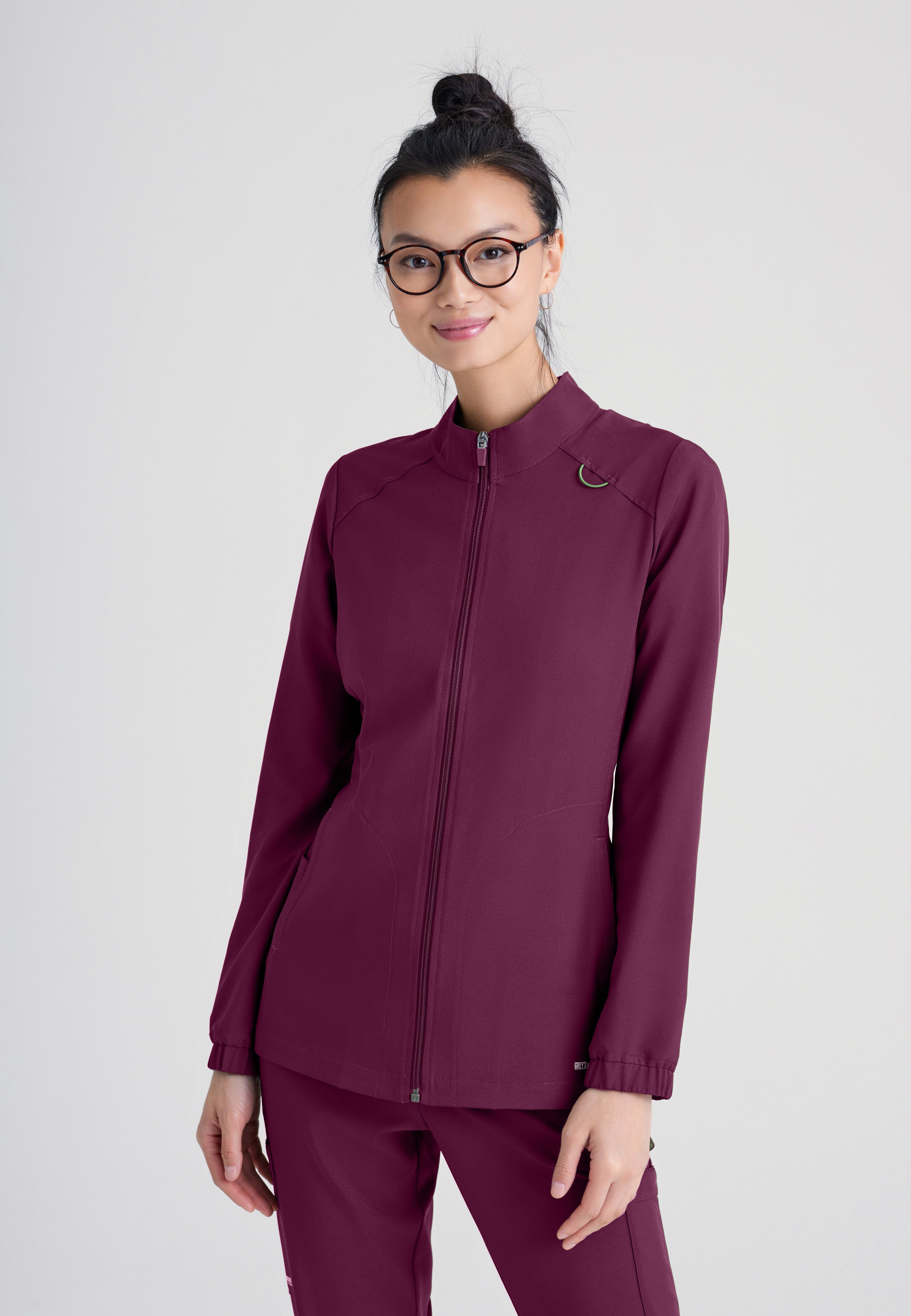 Front View of the Virtue 3-Pocket Stand-Up Collar Ciclo® Scrub Jacket in Wine from Grey's Anatomy™ by Barco Evolve