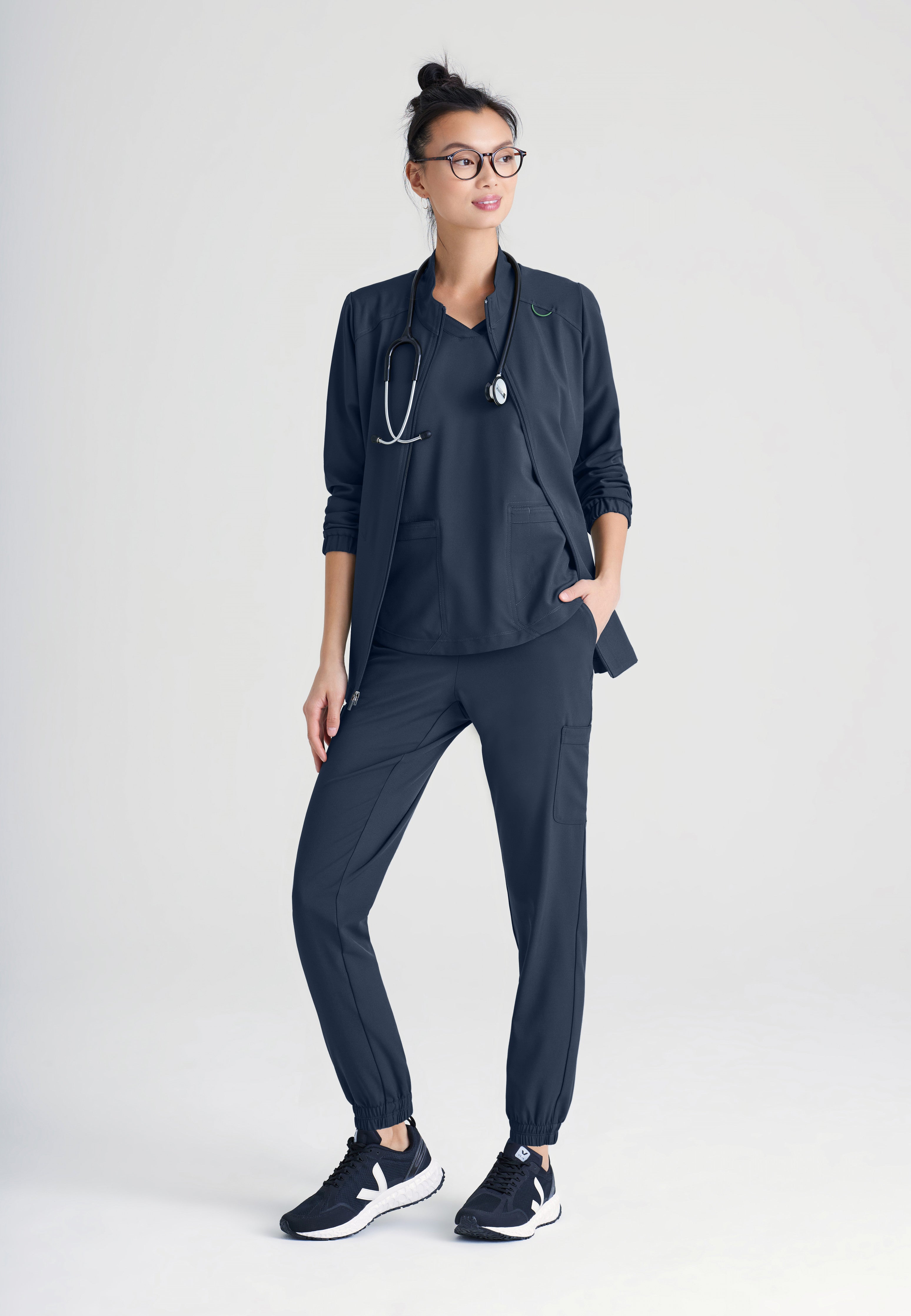 Full Body View of the Virtue 3-Pocket Stand-Up Collar Ciclo® Scrub Jacket in Steel from Grey's Anatomy™ by Barco Evolve